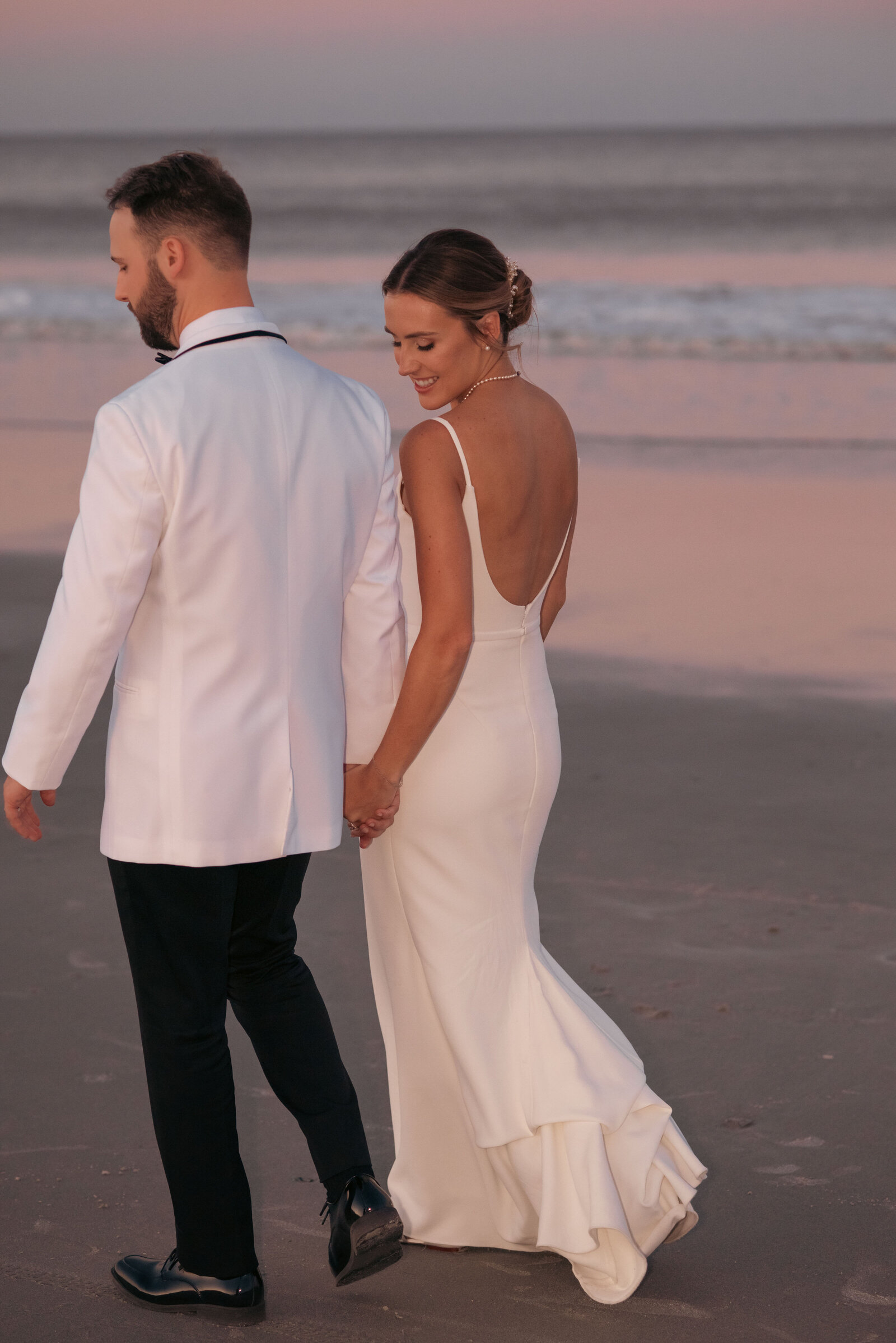 Embassy Suites St Augustine Beach wedding Wedding photos by Chabeli Woolsey Black Tie and Co-41