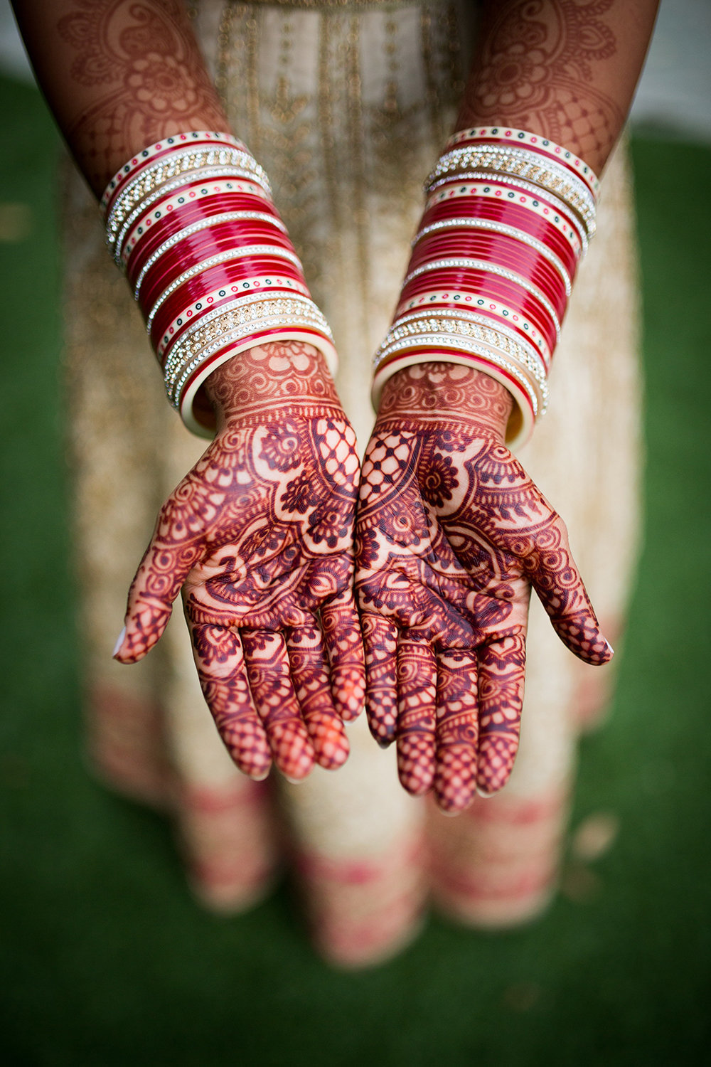 Henna Artistry and Bangles Close Up on Hindu Bride