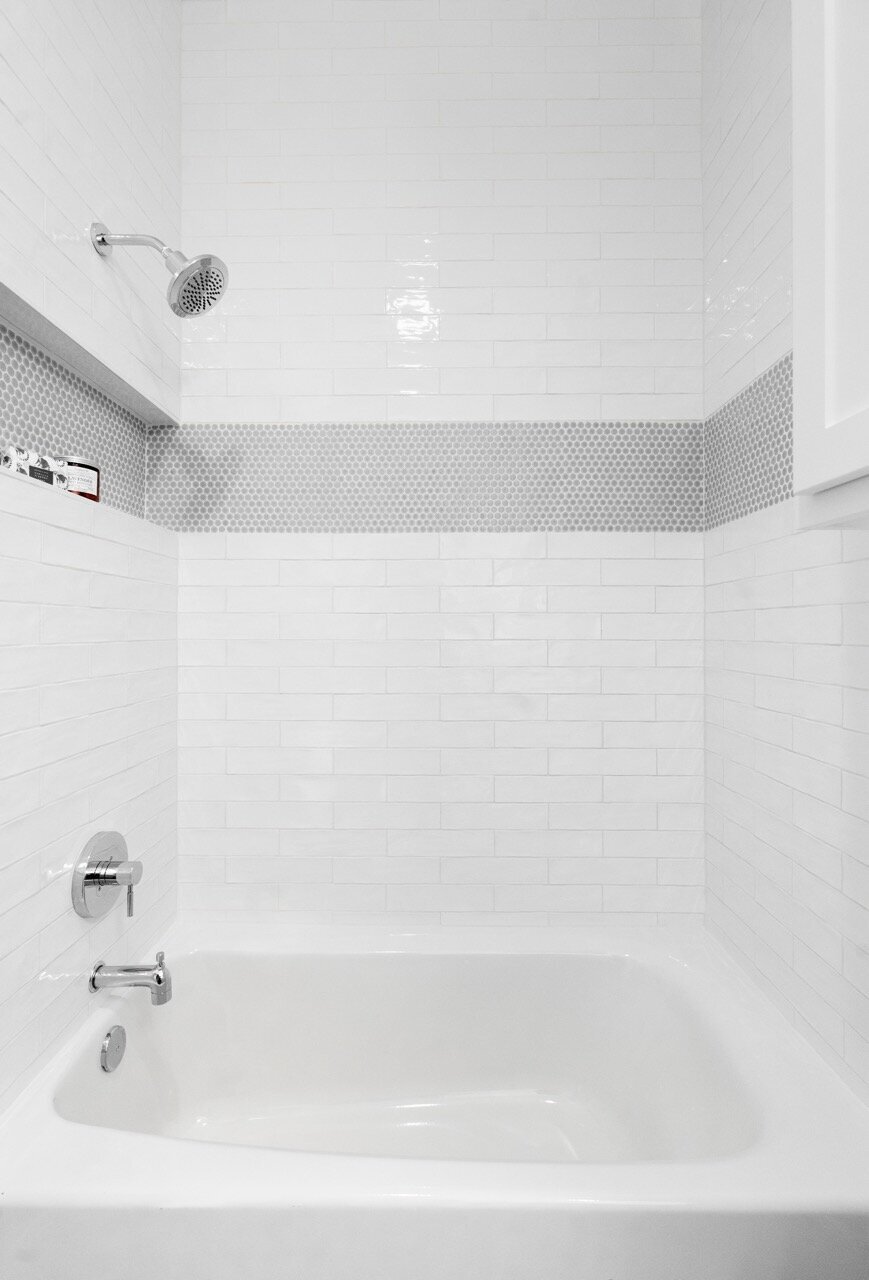 Nuela Designs Penny Round Tile Stripe Bathroom