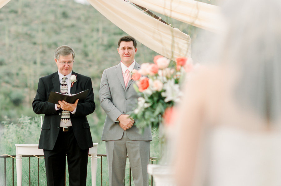 Tucson Saguaro Buttes Wedding Photo of Groom Crying as Bride Comes Down the Aisle | Tucson Wedding Photographer | West End Photography