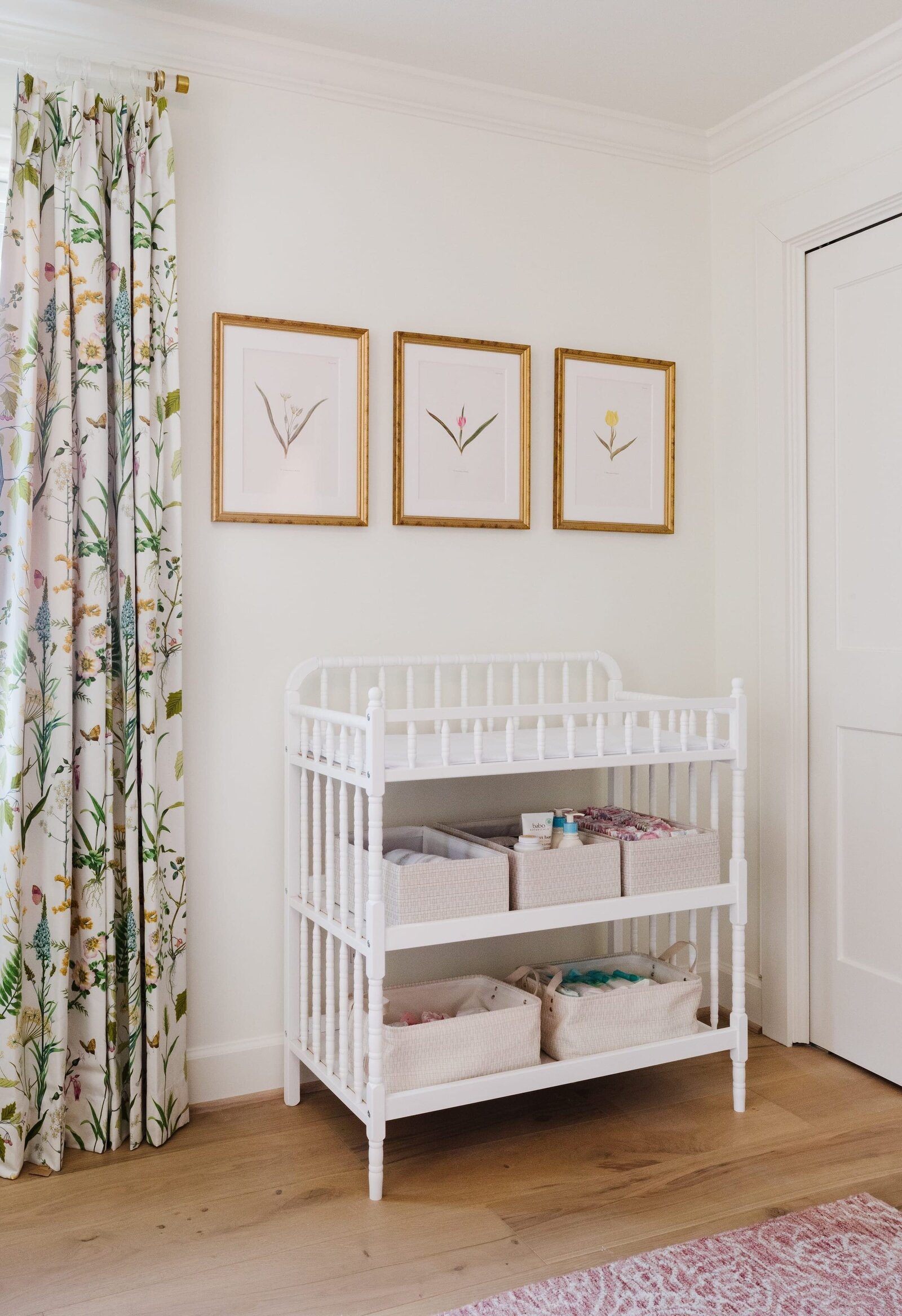 vision and hammer nursery with gold picture frames