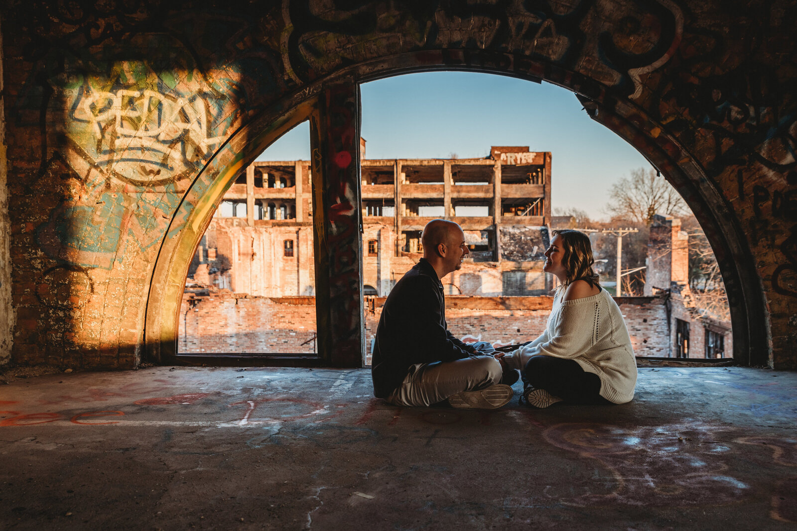Cleveland Couple sits in abandoned building, photography by Paige Mireles