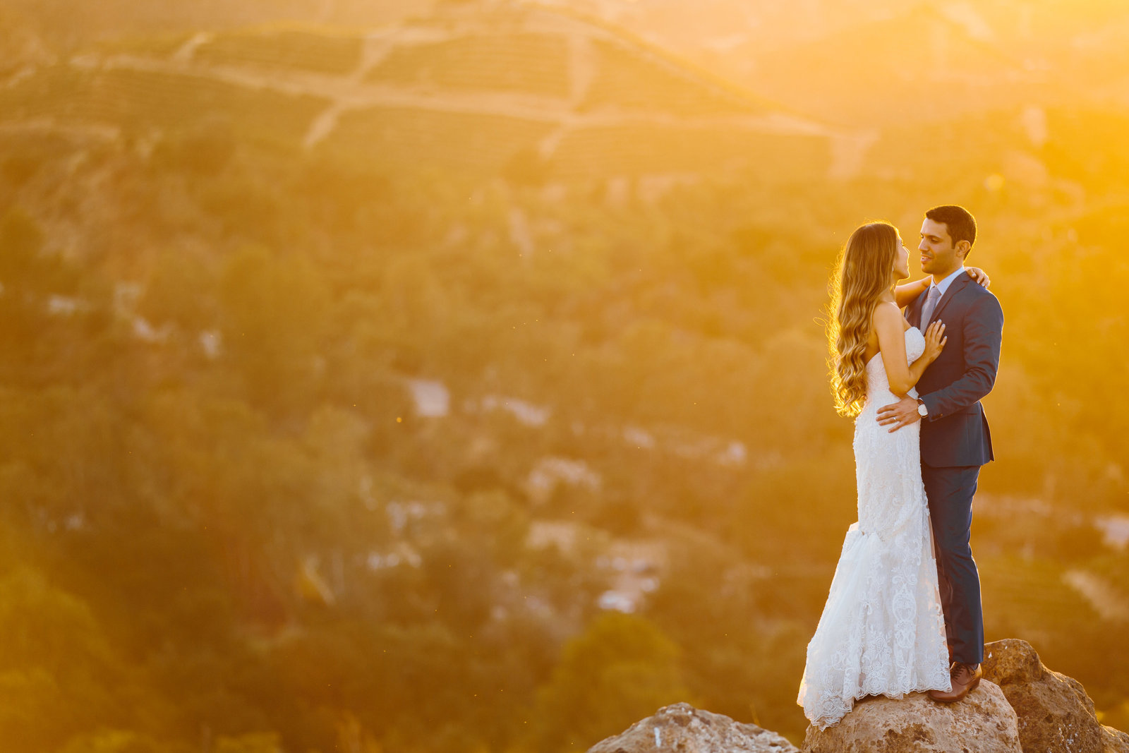Wedding Couple on a hilltop at sunset in Malibu California