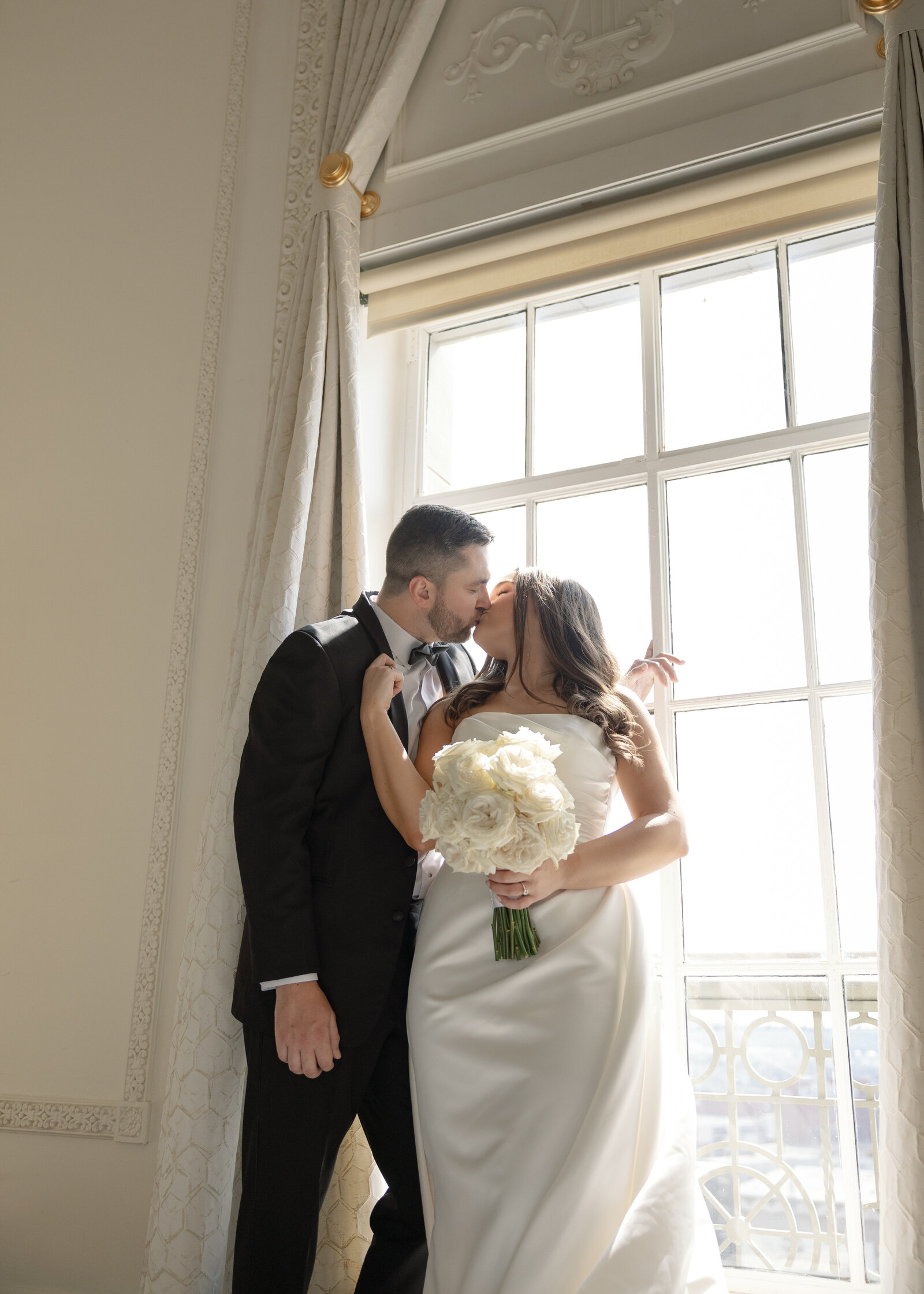 Bride and Groom sharing a moment together before their ceremony at the Mayo Hotel in Tulsa, Oklahoma.