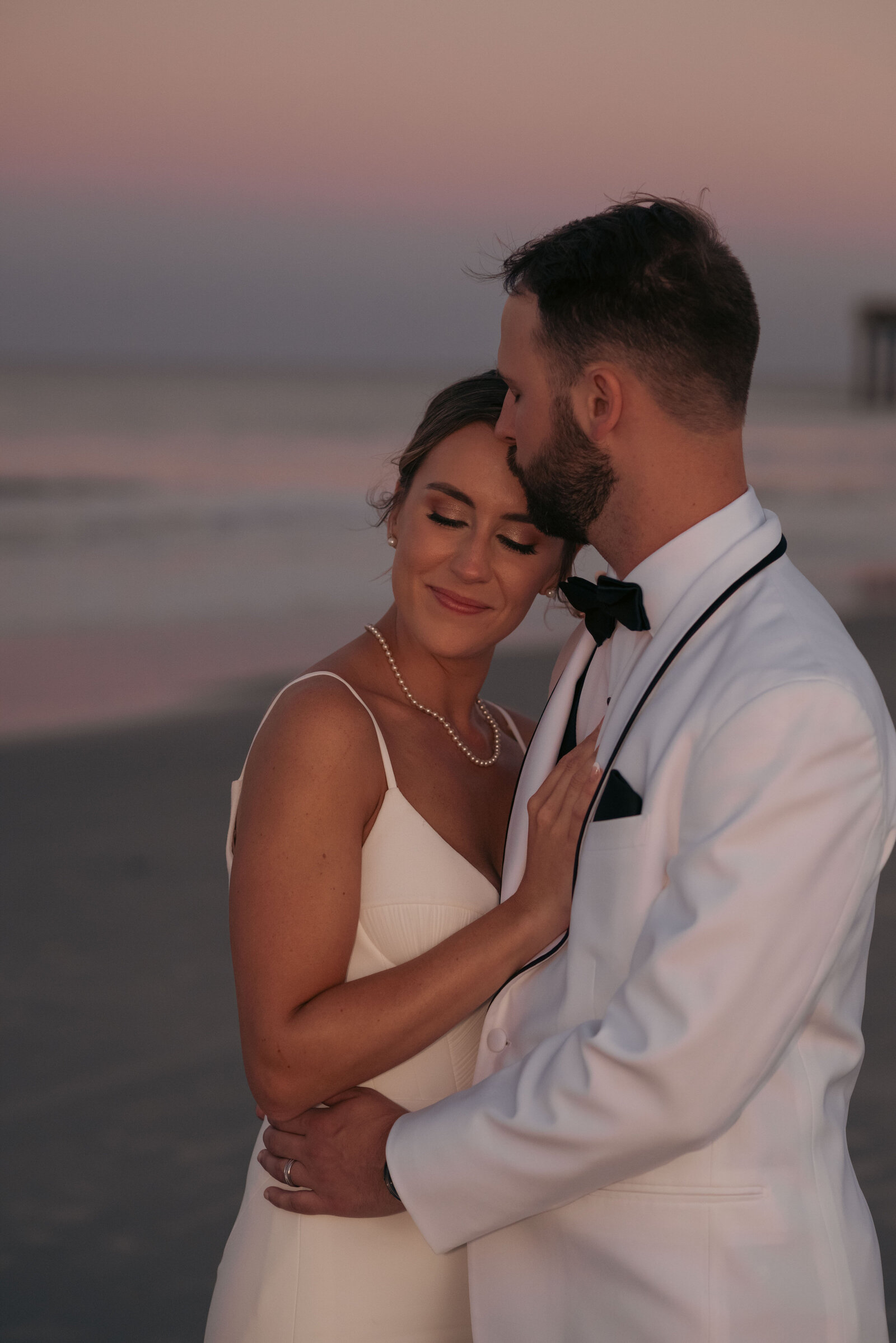 Embassy Suites St Augustine Beach wedding Wedding photos by Chabeli Woolsey Black Tie and Co-95