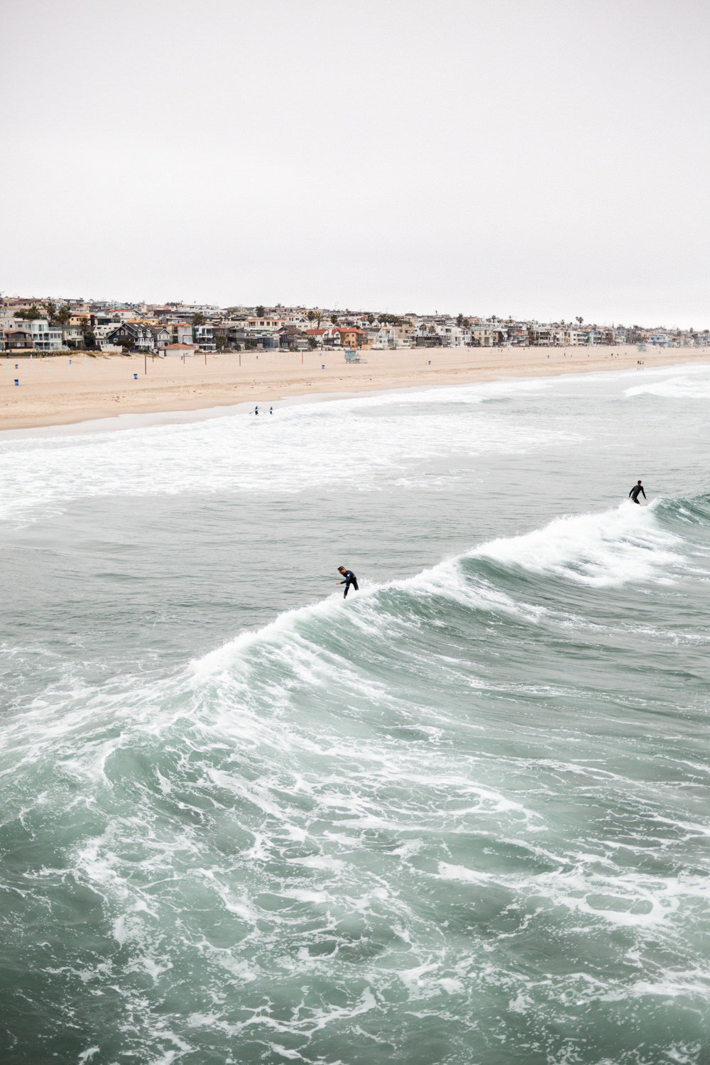 Manhattan Beach surfers in Los Angeles California by Danielle Motif Photography
