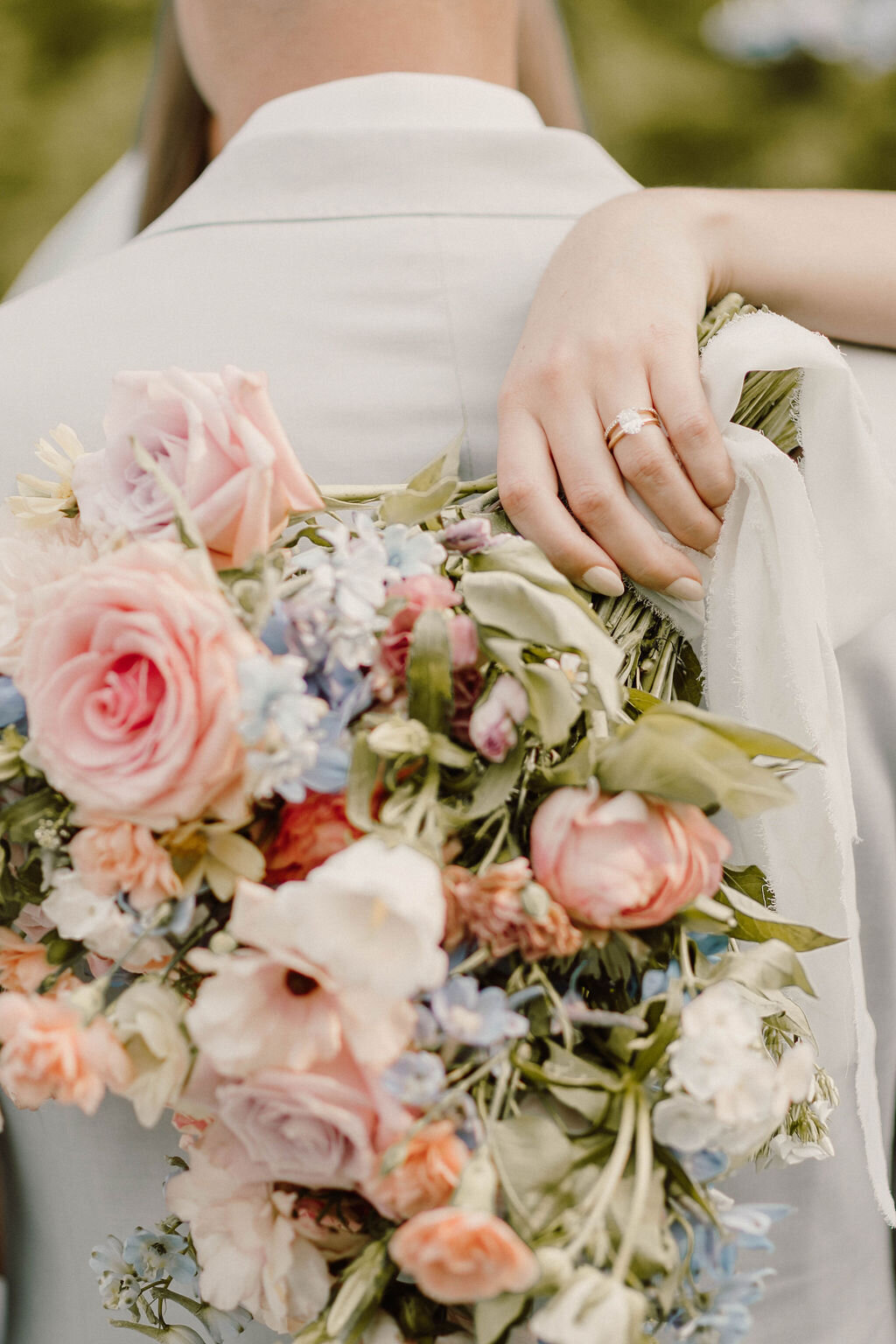 Shades of pink, peach, and blue floral bouquet