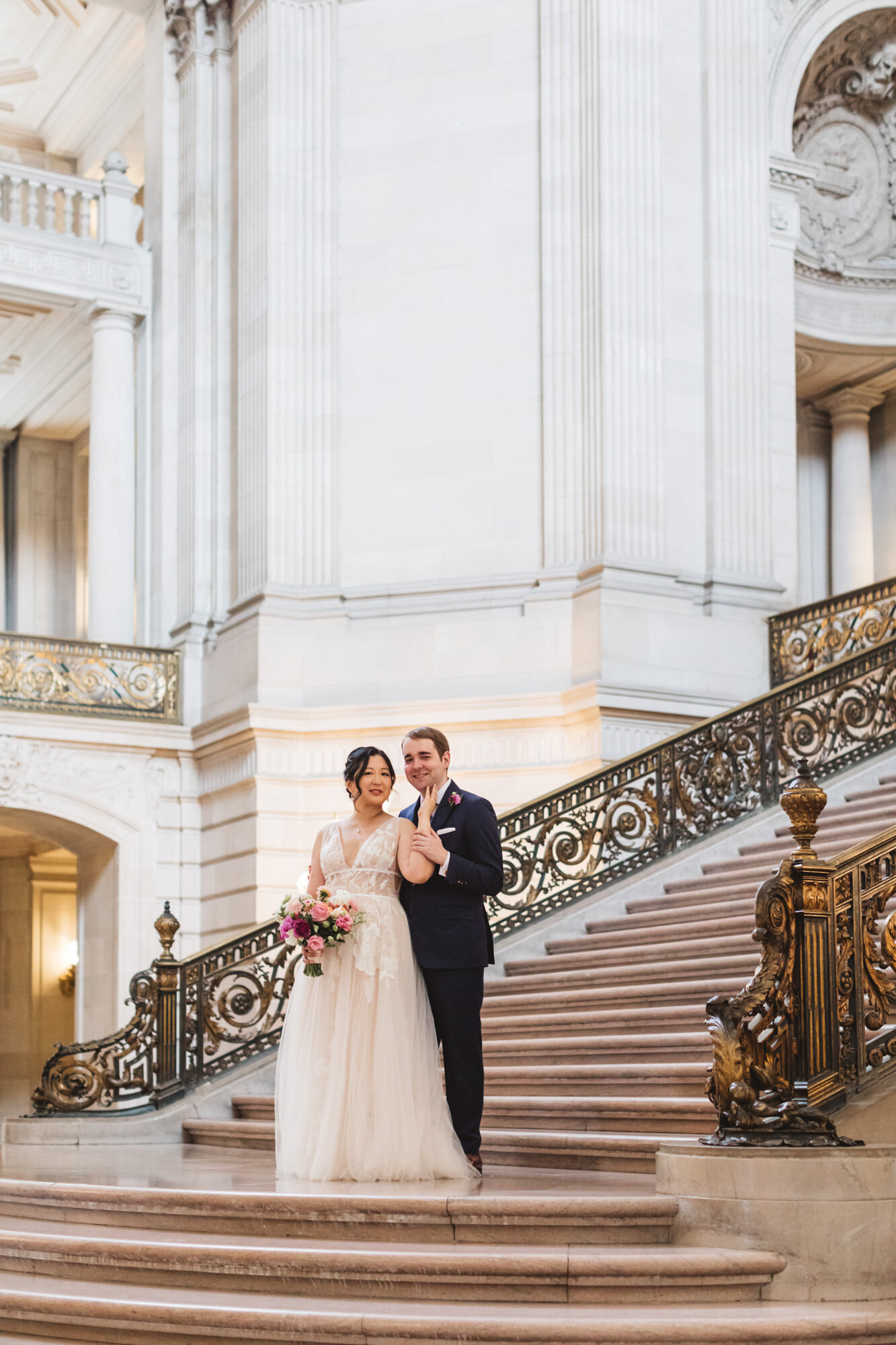 beautiful Grand Staircase shot with bride and groom