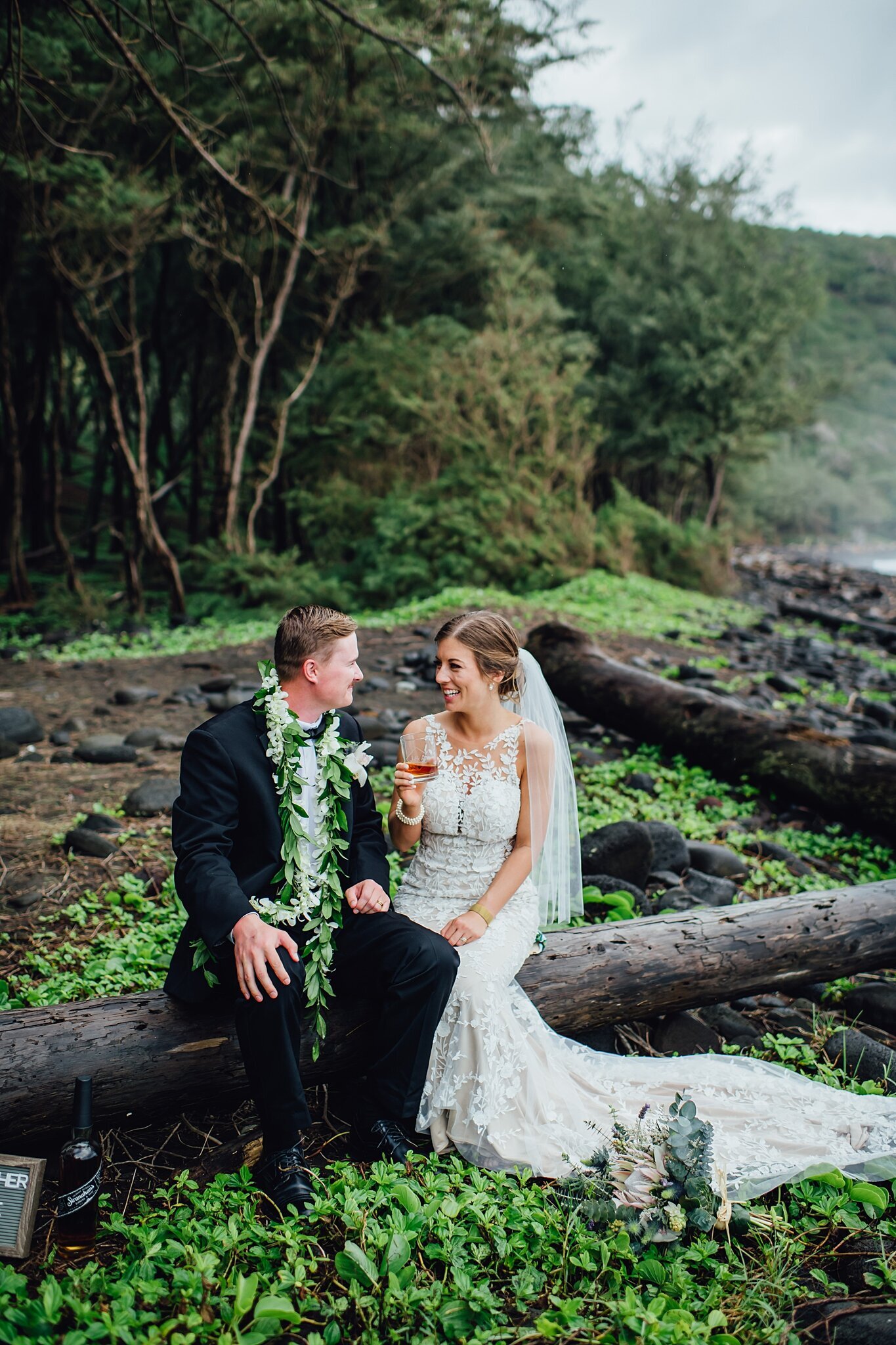 bride and groom cheers during big island  elopement