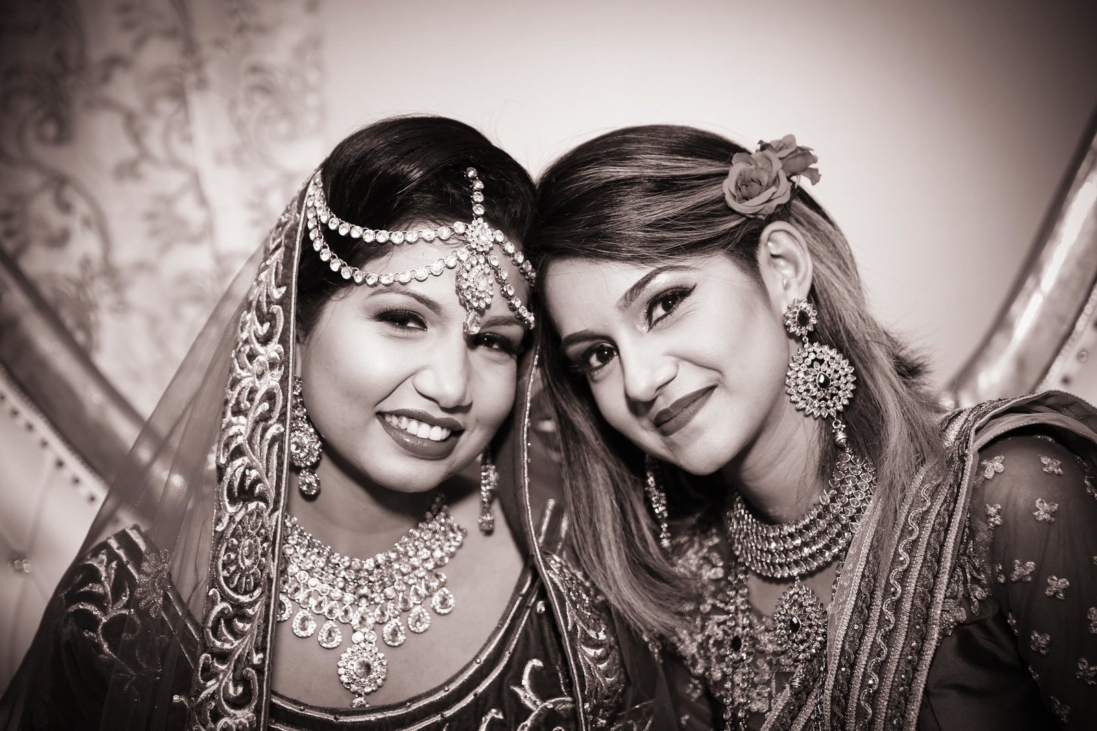 Sisters at Indian wedding in B+W. Photo by Ross Photography, Trinidad, W.I..