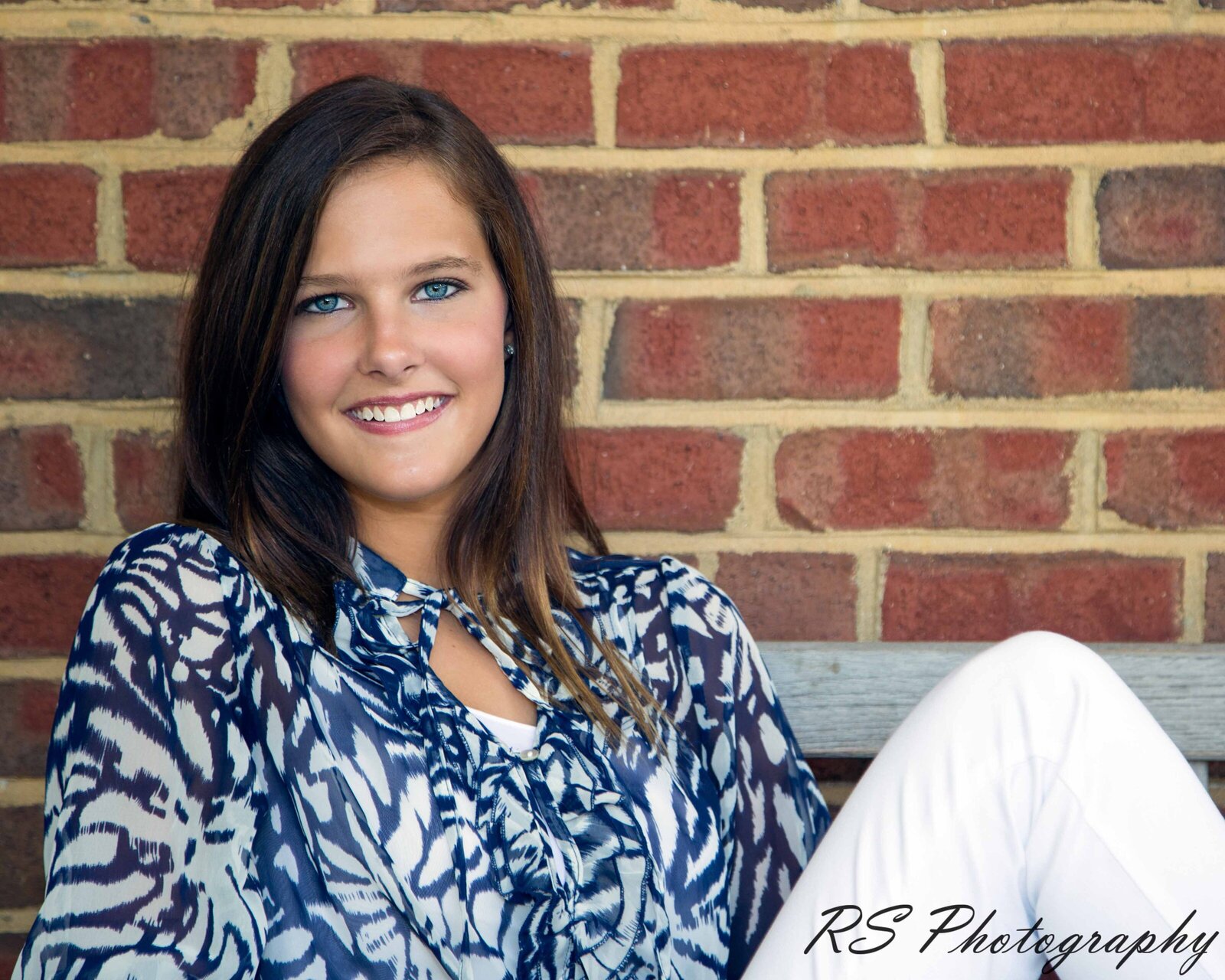 Senior photo shoot in Charlotte against nice brick wall background with Ron Schroll Photography in Charlotte, NC
