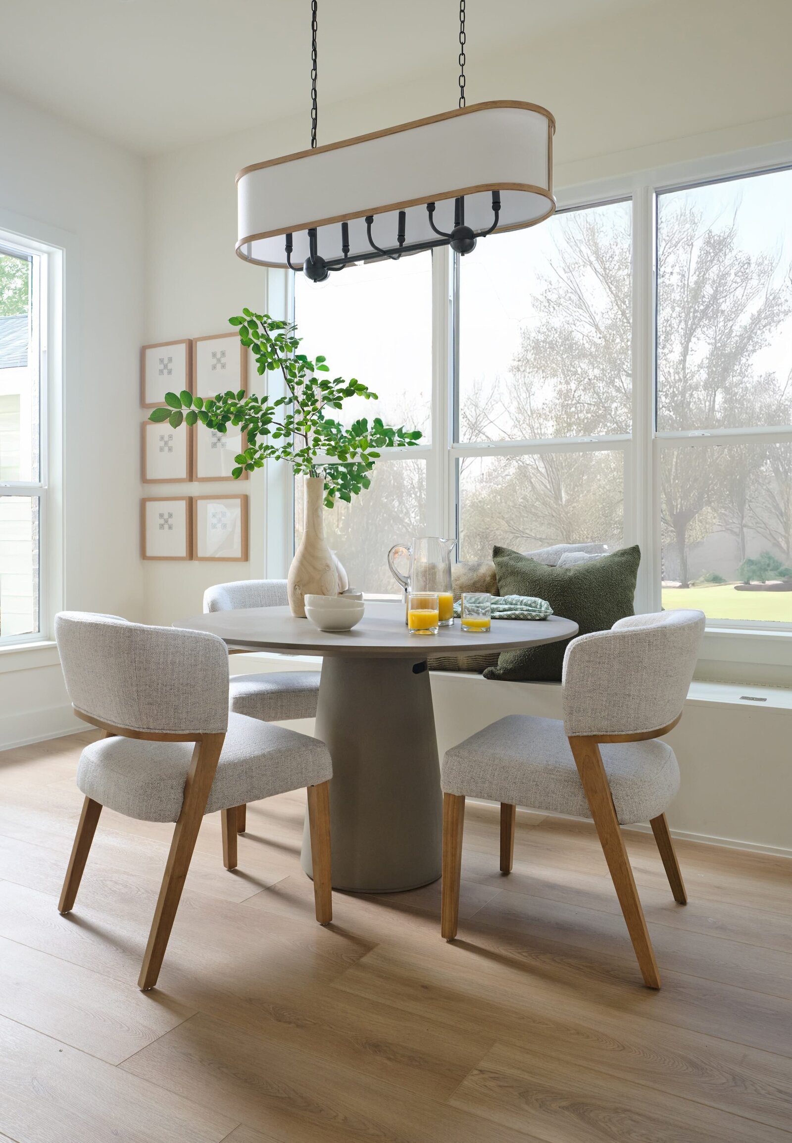 cocoloba homes graham dining room round table with large windows