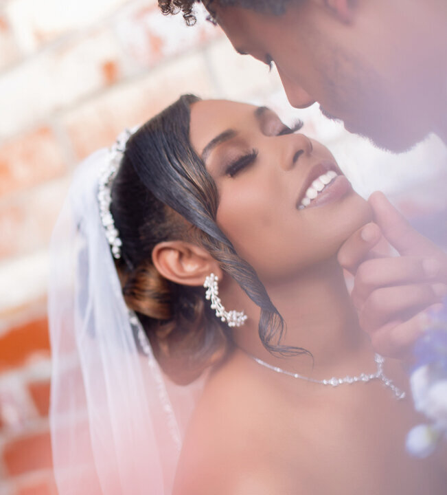 Wedding Couple sharing a kiss during their wedding in atlanta georgia 