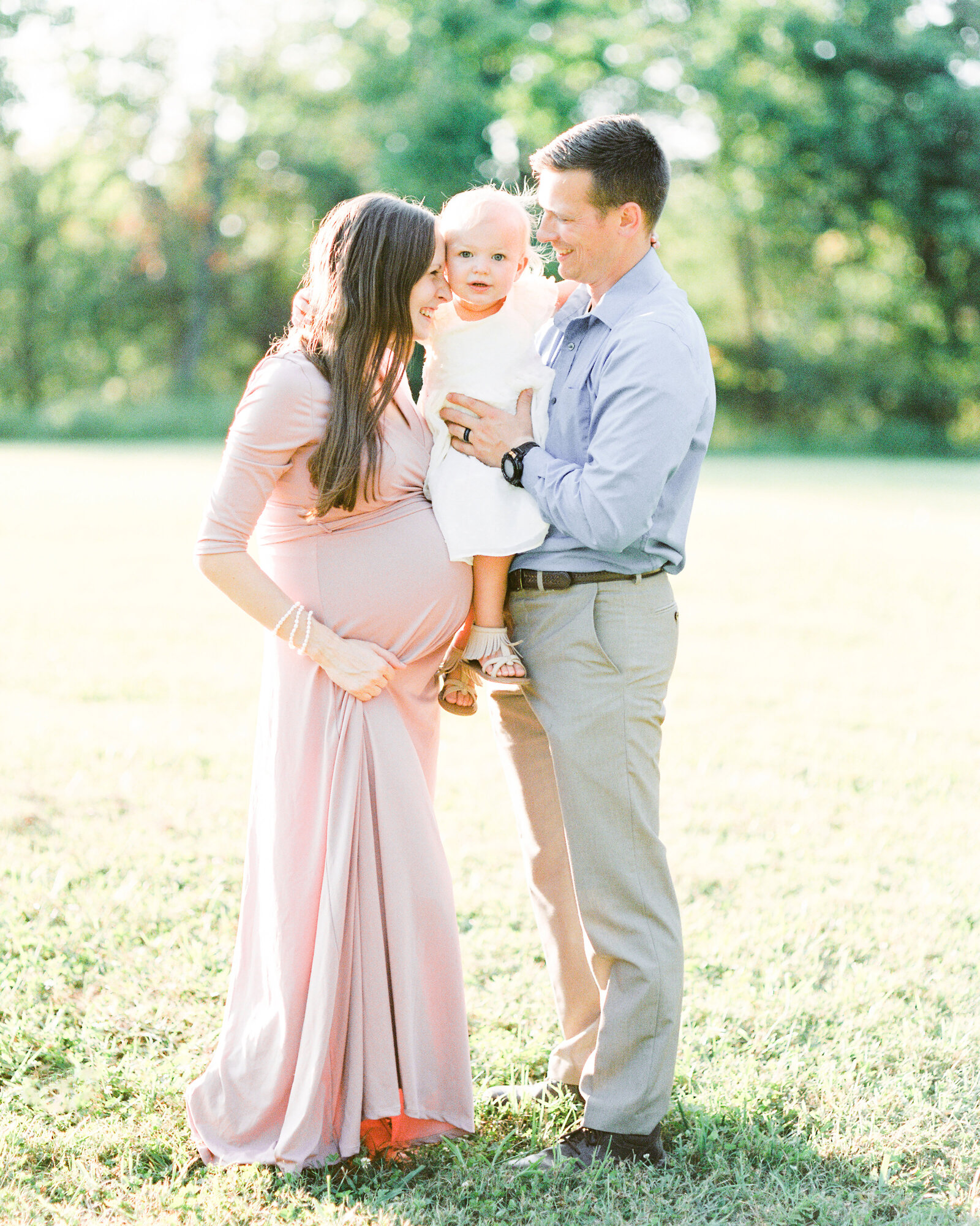 Maternity session with parents and toddler girl