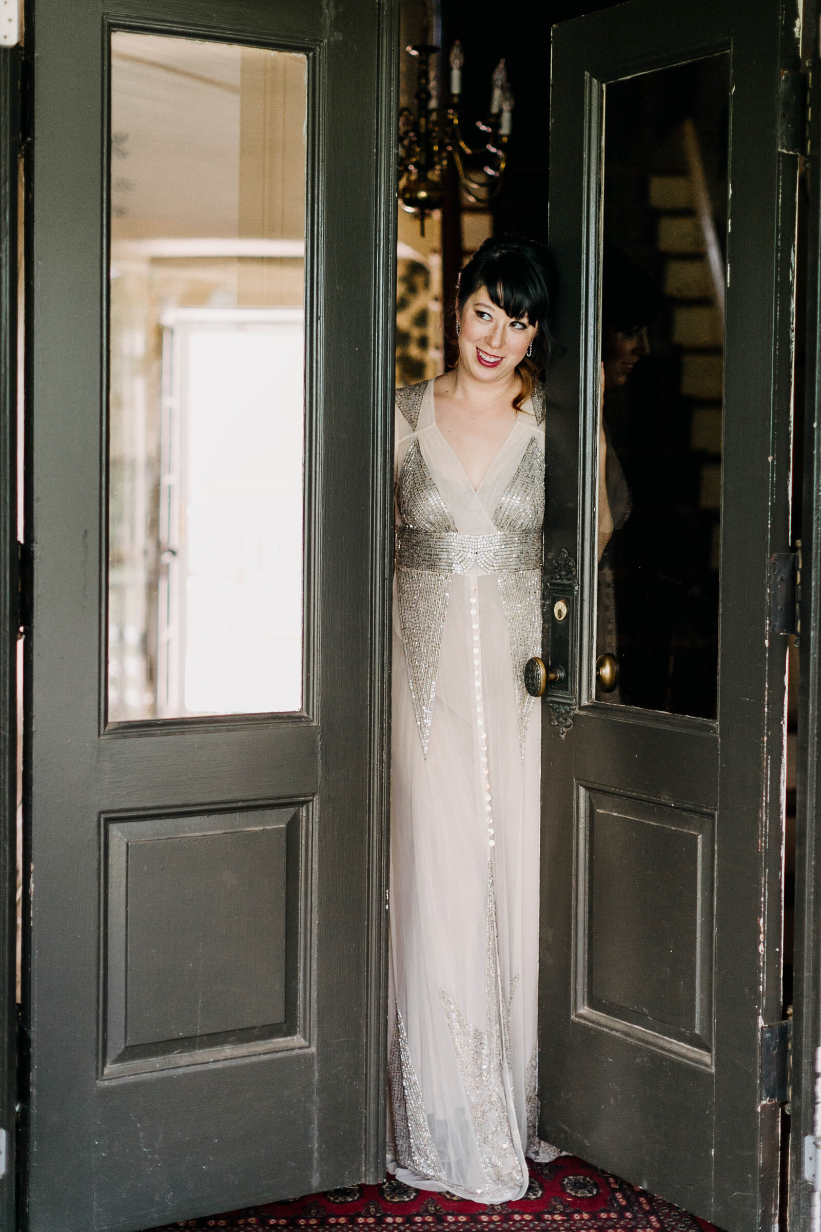 bride with sequins dress at vintage doors