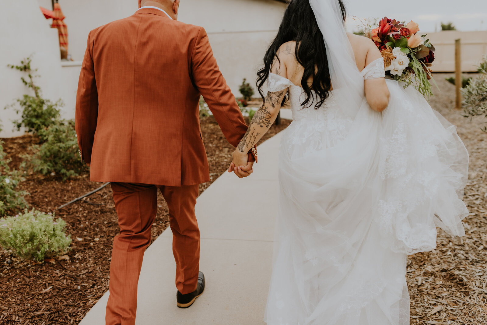 Bride and Groom details holding hands Temecula, California Wedding and lifestyle photographer Yescphotography