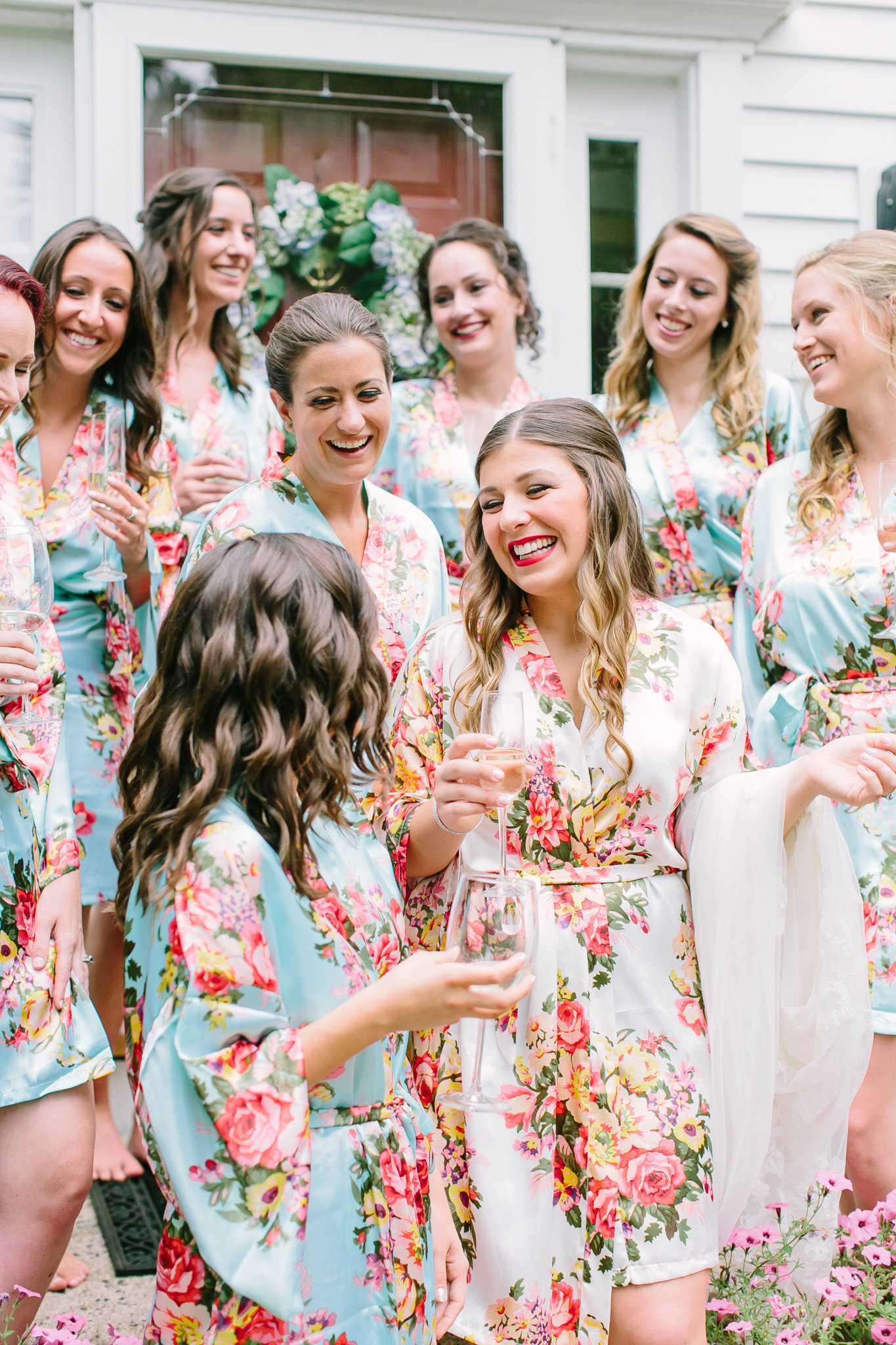 bridesmaids laughing in silk robes