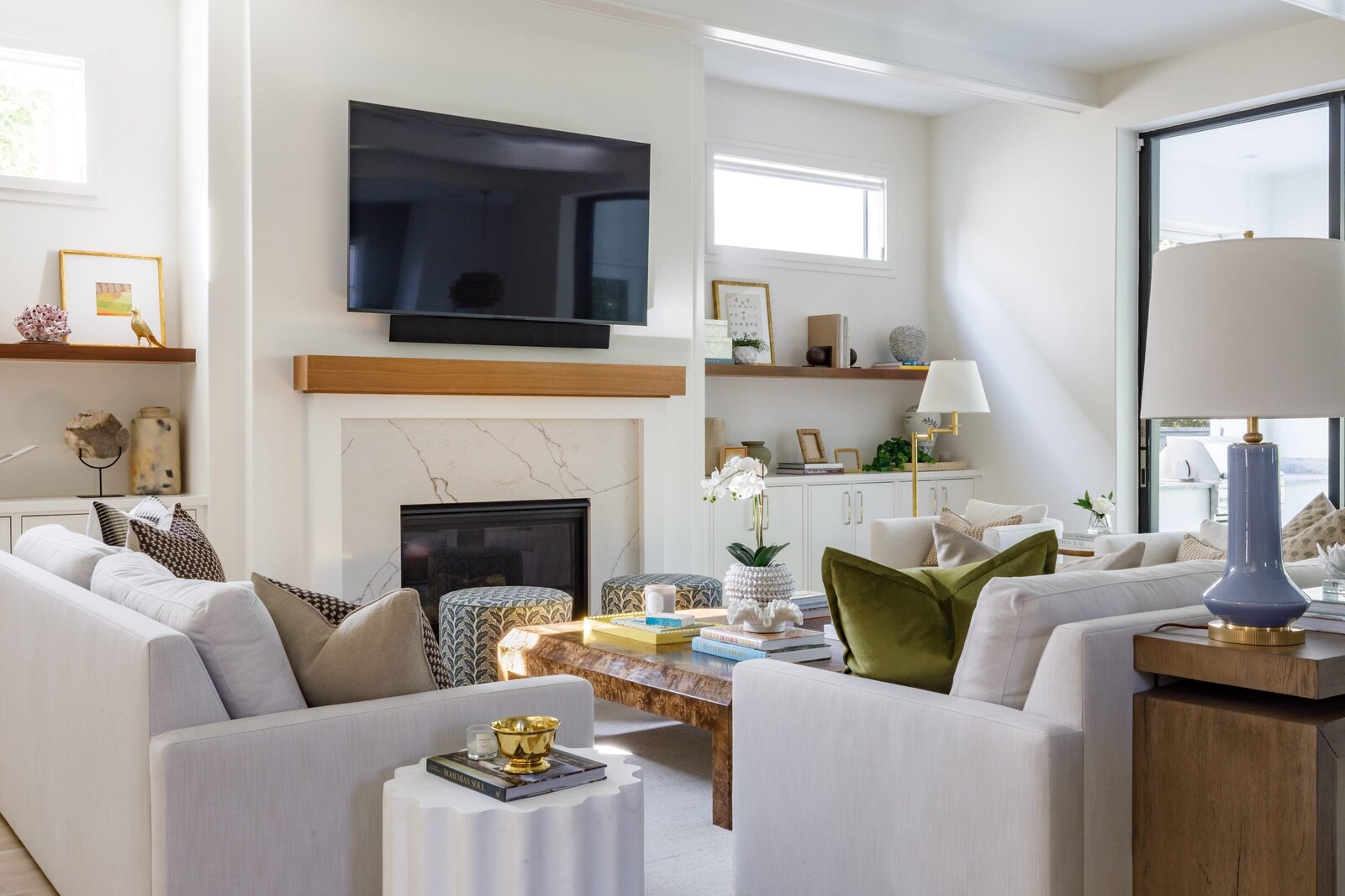 vision and hammer living room with wooden mantle