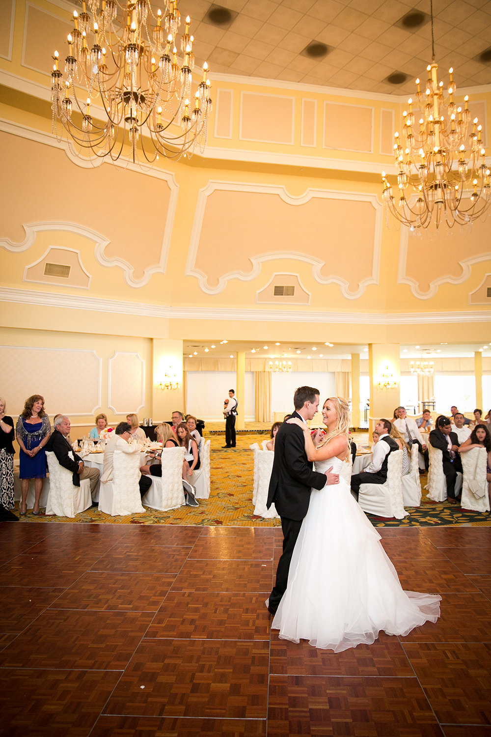 The chandeliers at the Hotel Del Coronado make such a romantic scene for the first dance.