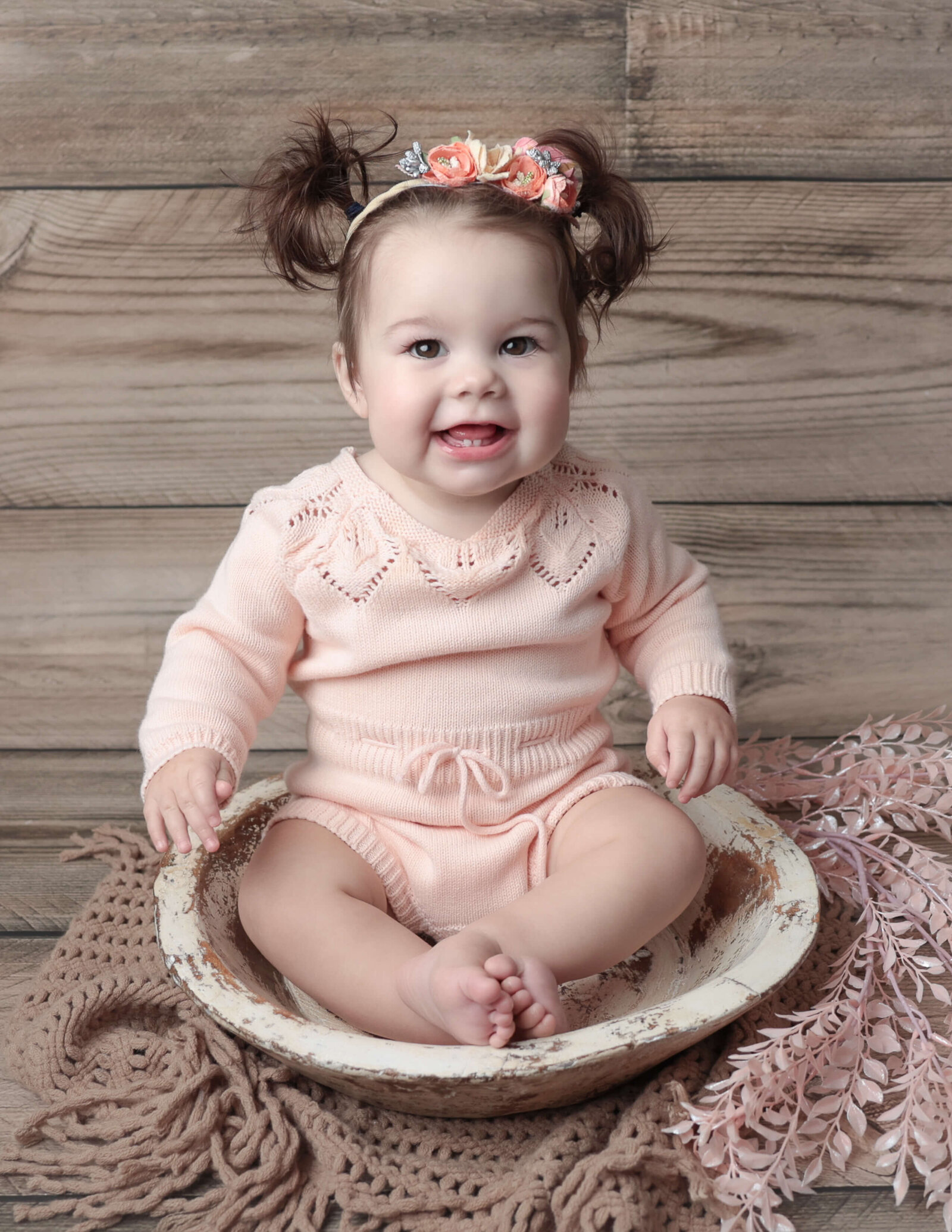 Precious one year old posed in a bowl at our Rochester, NY studio.
