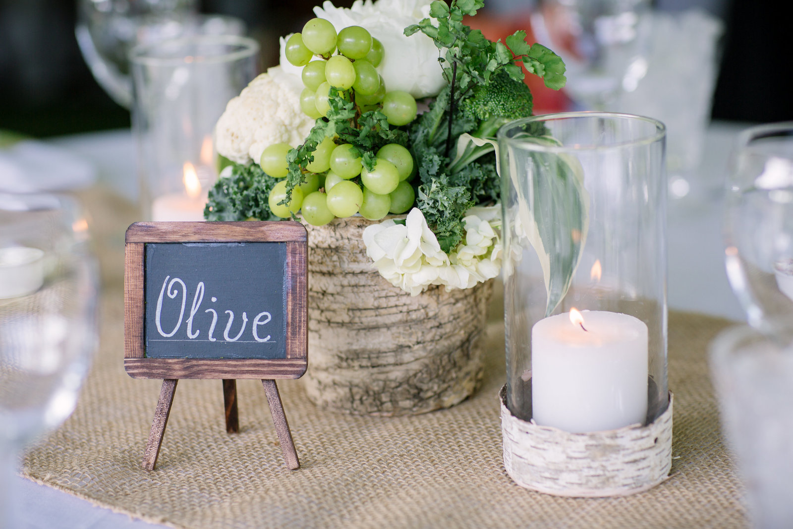 Unique centerpiece with herbs and veggies and mini chalkboard