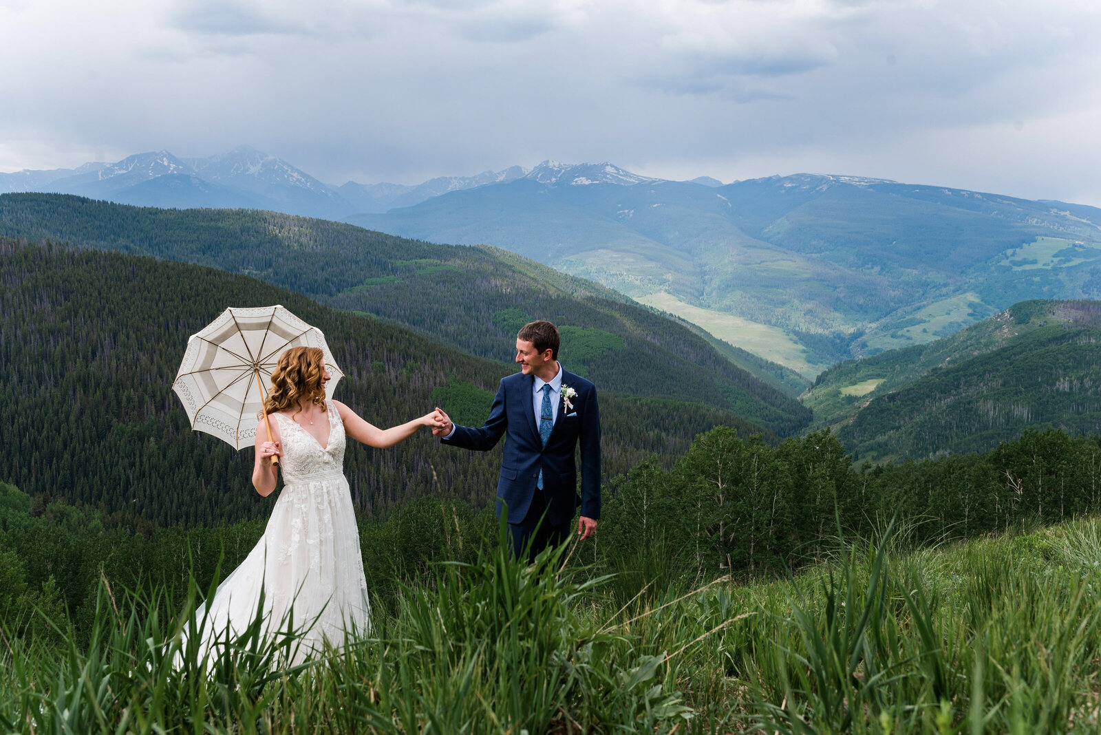 bride-groom-photography-at-vail-wedding-deck-mountain-views-in-colorado-10