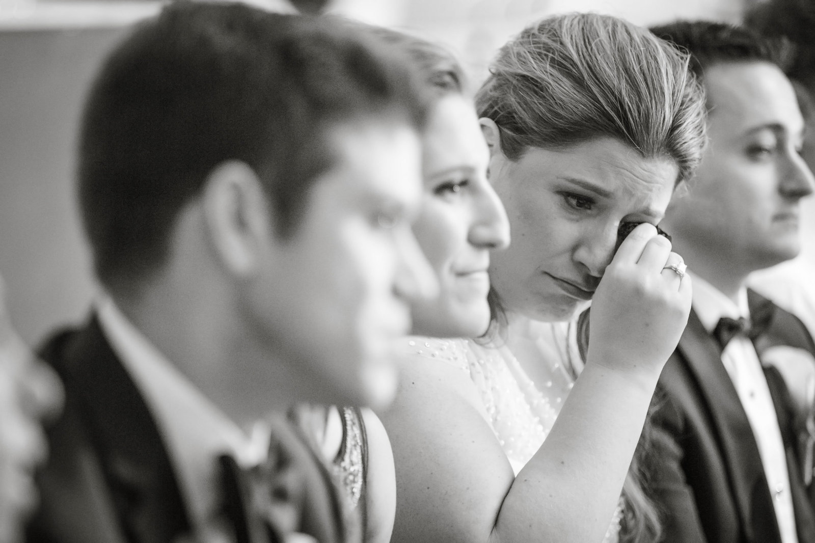 mother of the bride crying during ceremony at Engineers Country Club