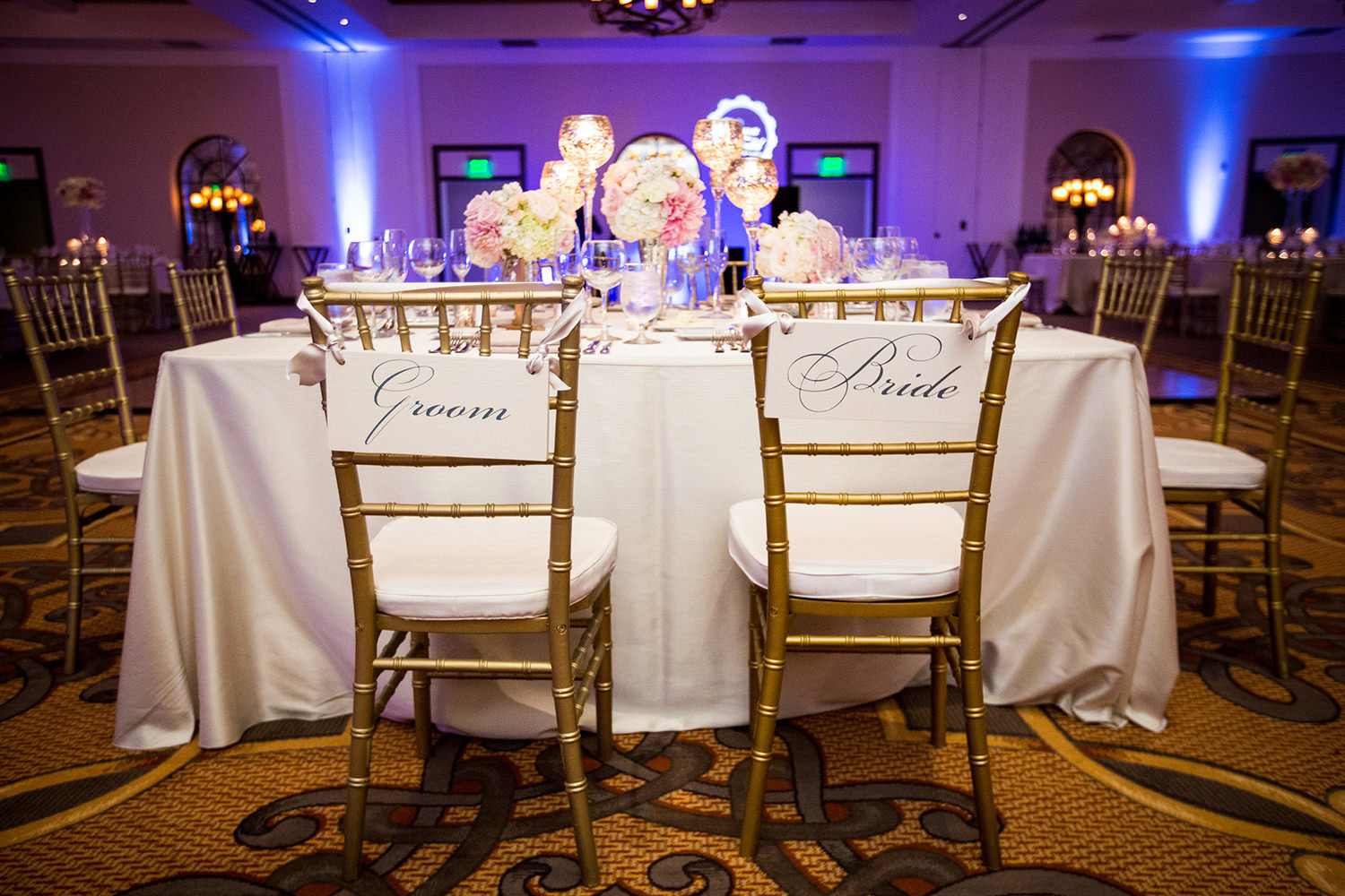Head table during a wedding reception.