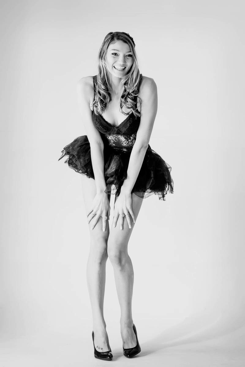 Ms L wears a black lacy bodysuit and tulle tutu, Boudoir Photography, Charleston, SC
