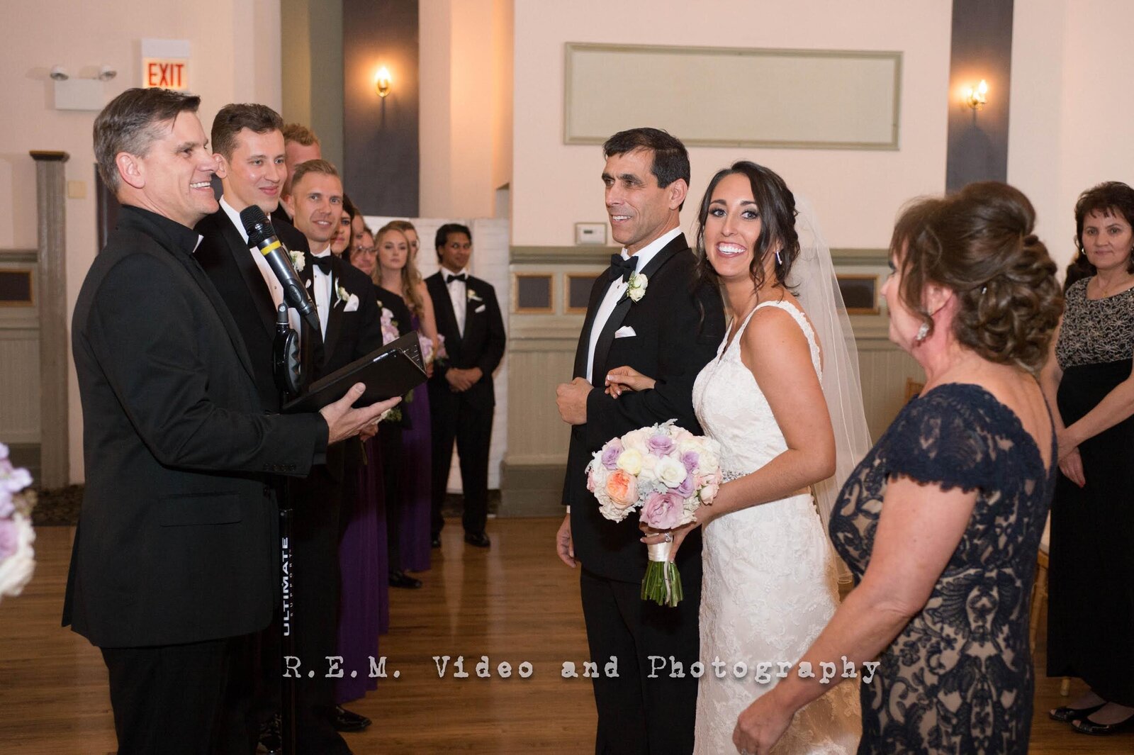 Bride smiles during wedding ceremony