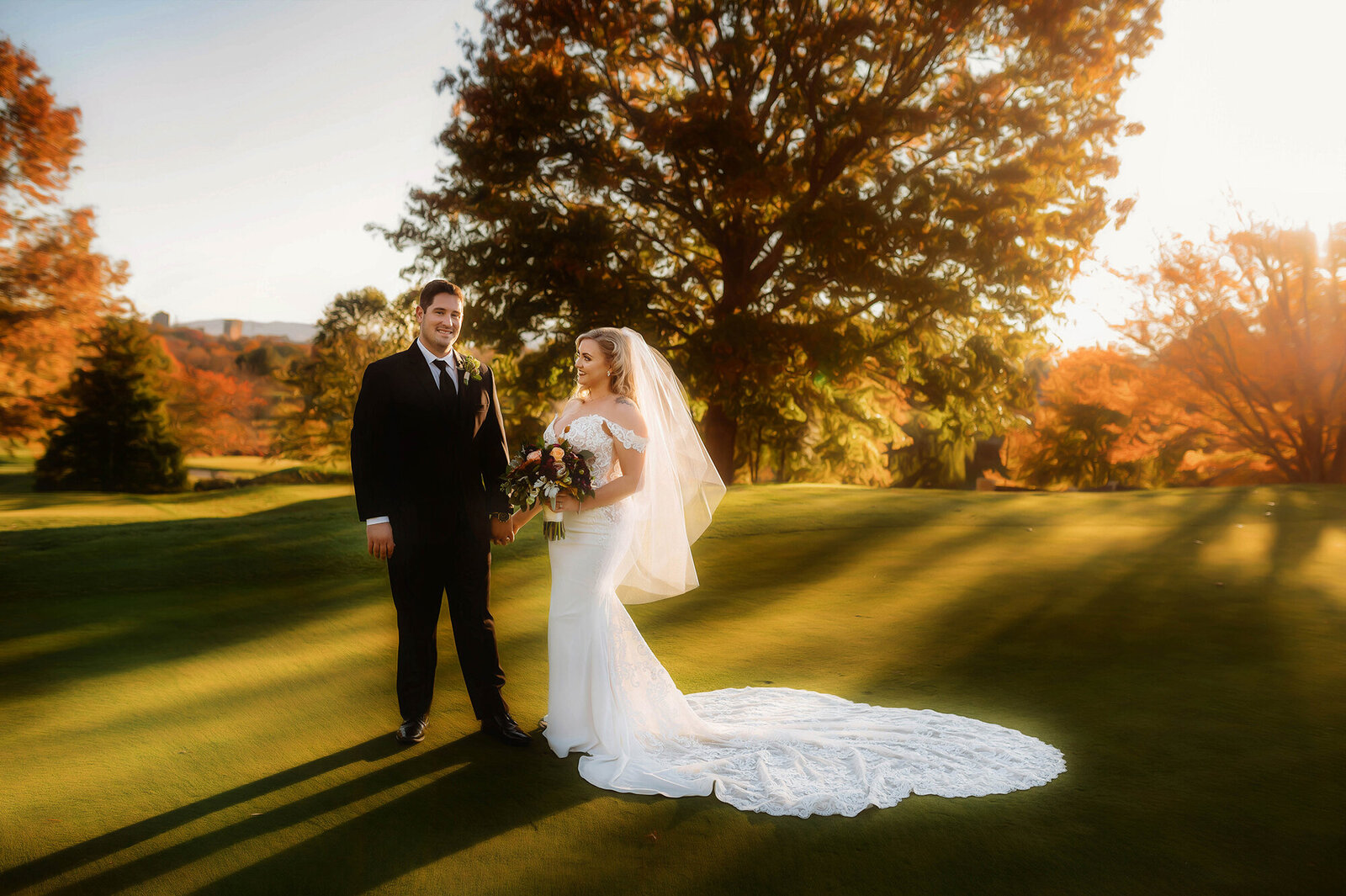 Bride and Groom pose for portraits after their Elopement Ceremony at Grove Park Inn in Asheville, NC.