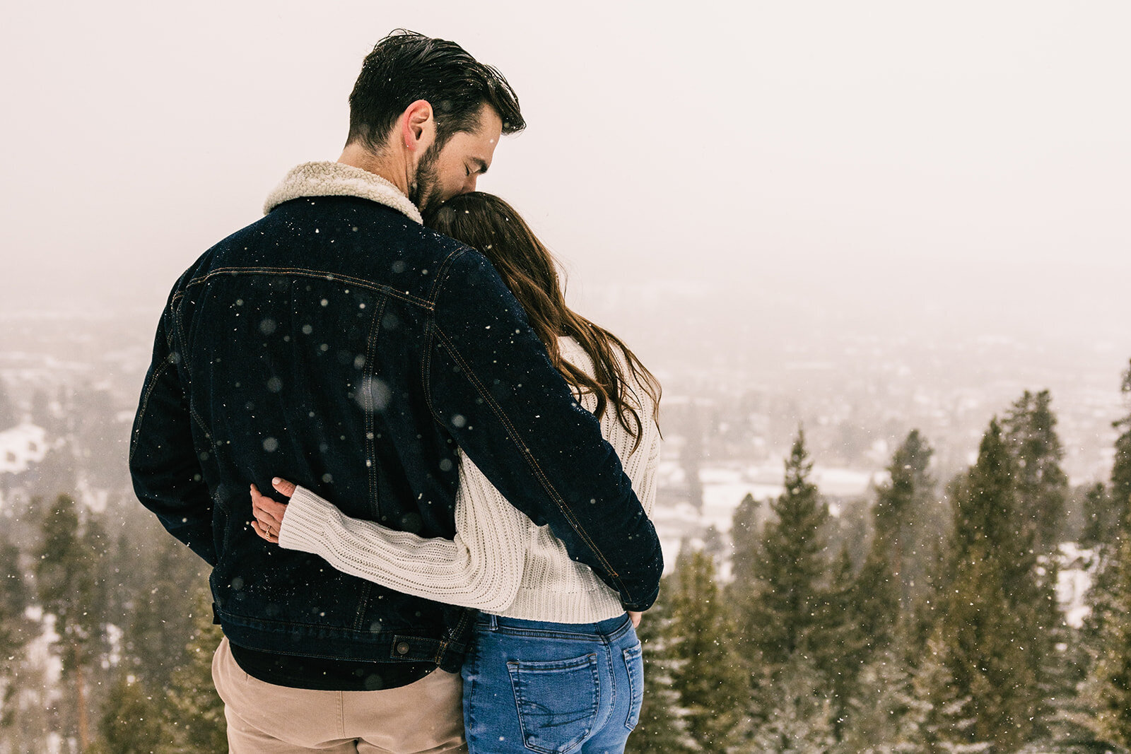 Couples engagement photos in Breckenridge while snow is falling