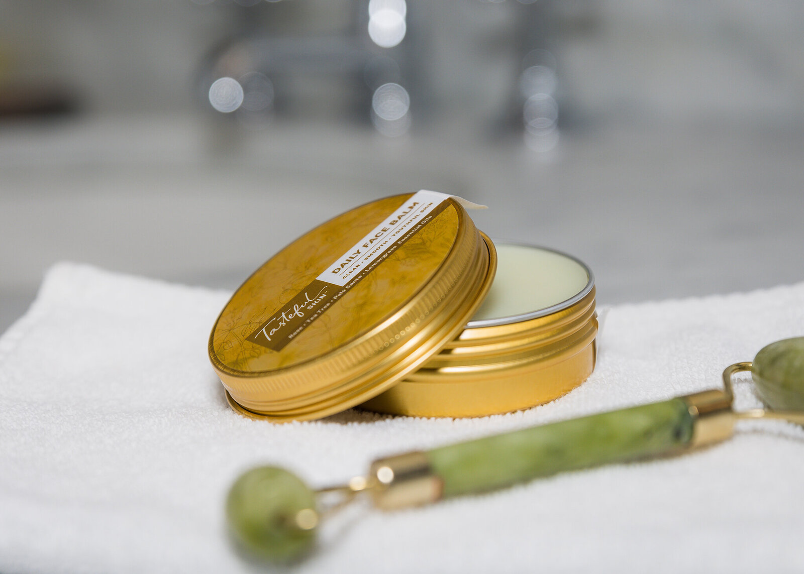 beauty product in a gold tin