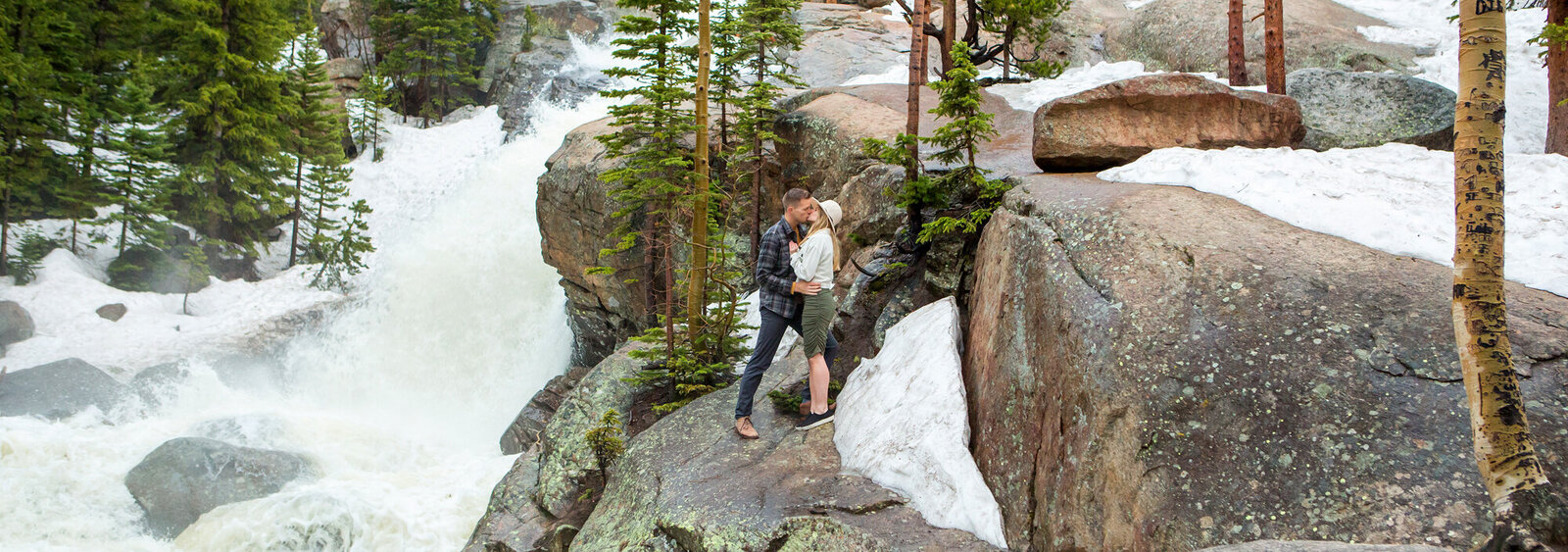 Colorado engagement photographer with couple in the mountains