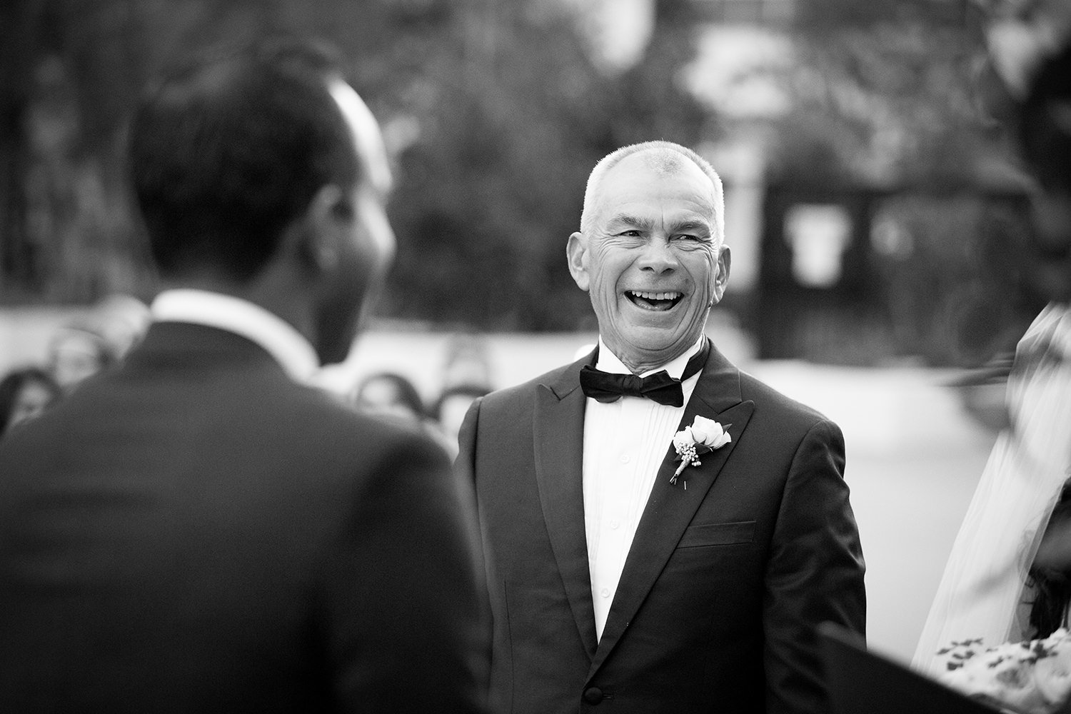 father of the bride crying and laughing