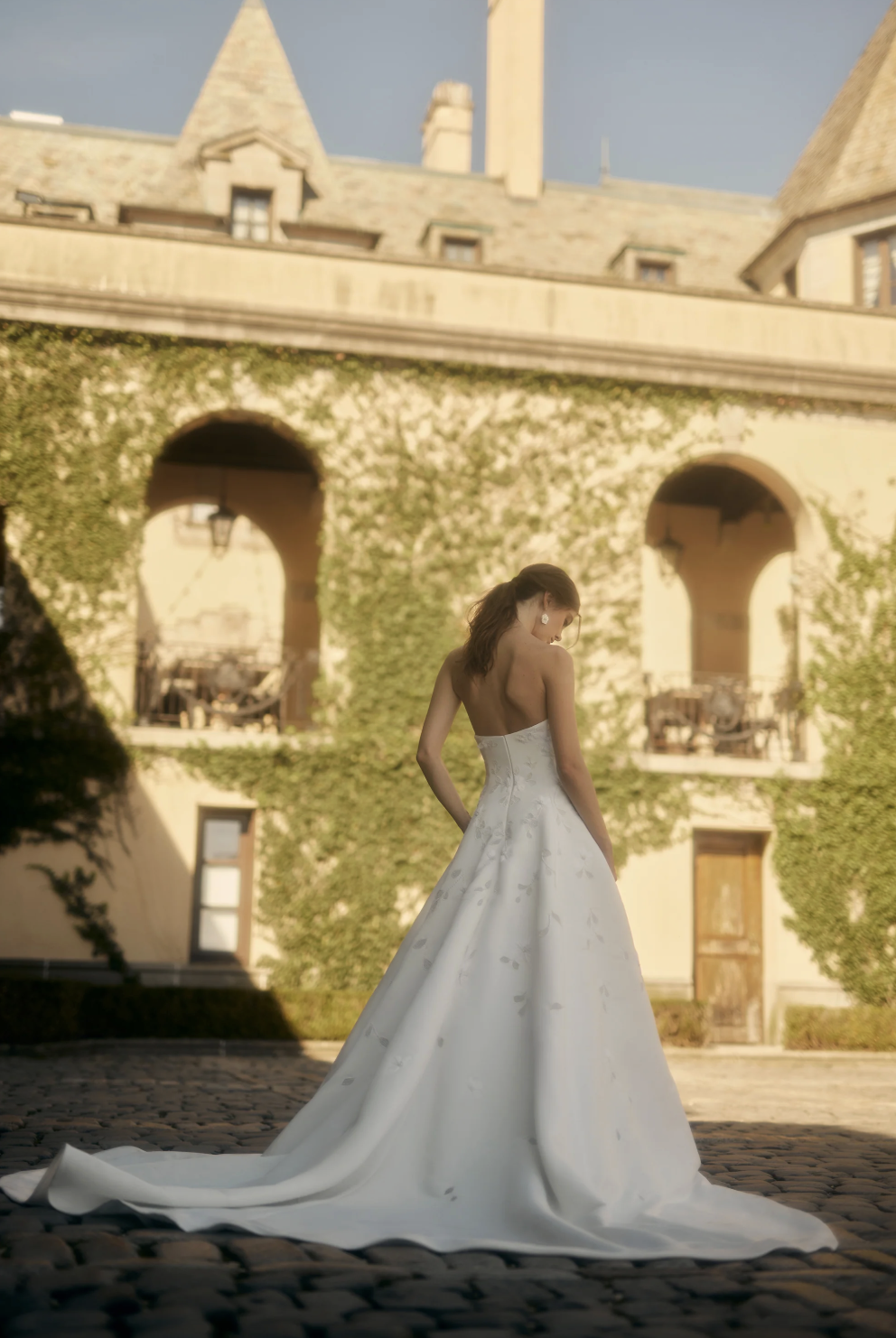 Denver CO Wedding Dress Shopping. Couture Wedding Dresses featuring Enaura with lace, pleating, basque waist, embroidery, & reception dresses. 