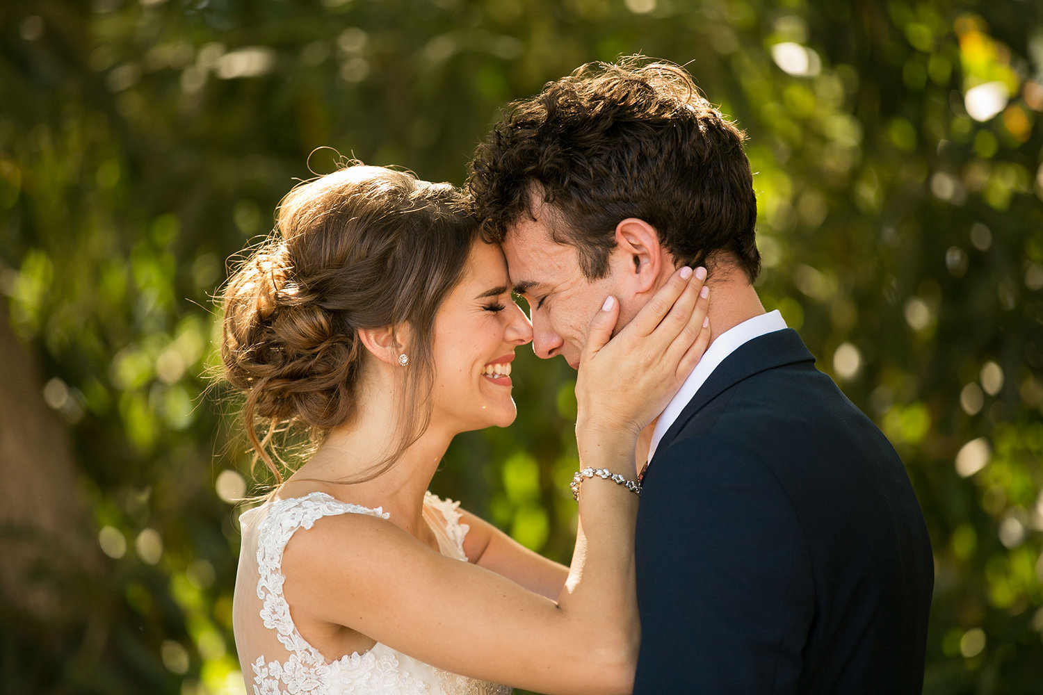 beautiful light with bride and groom at carlton oaks country club close up smiling