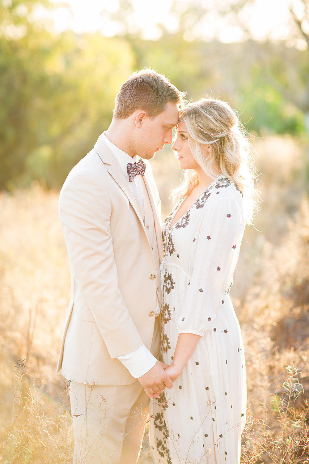 beautiful light with bride and groom open field