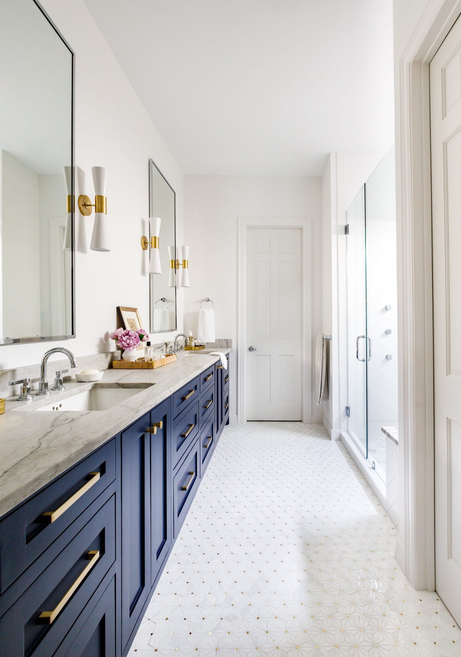 vision and hammer bathroom with dark blue painted cabinets