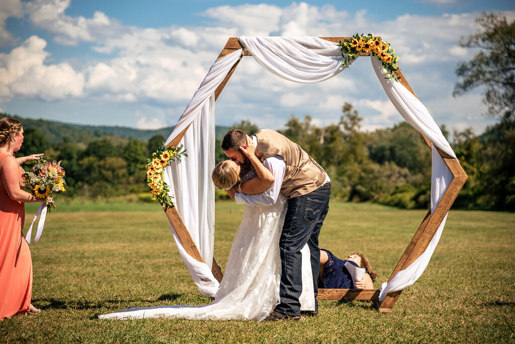 wedding ceremony first kiss officiant fell over