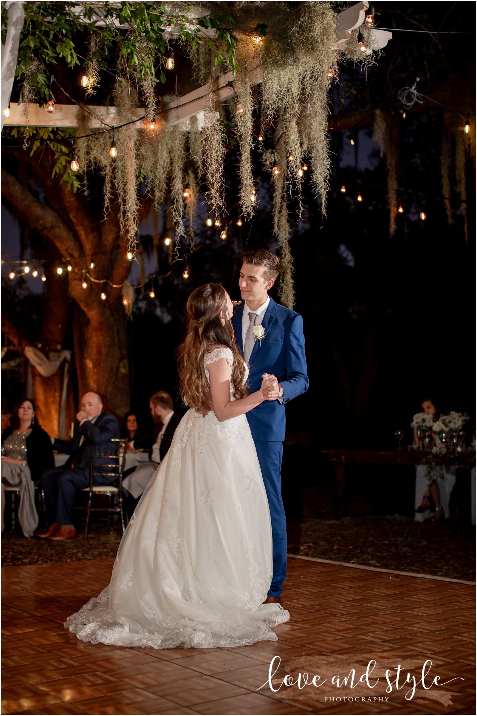 Bride and Groom dancing for the first time as husband and wife  at The Barn at Chapel Creek Wedding venue in Venice, Florida
