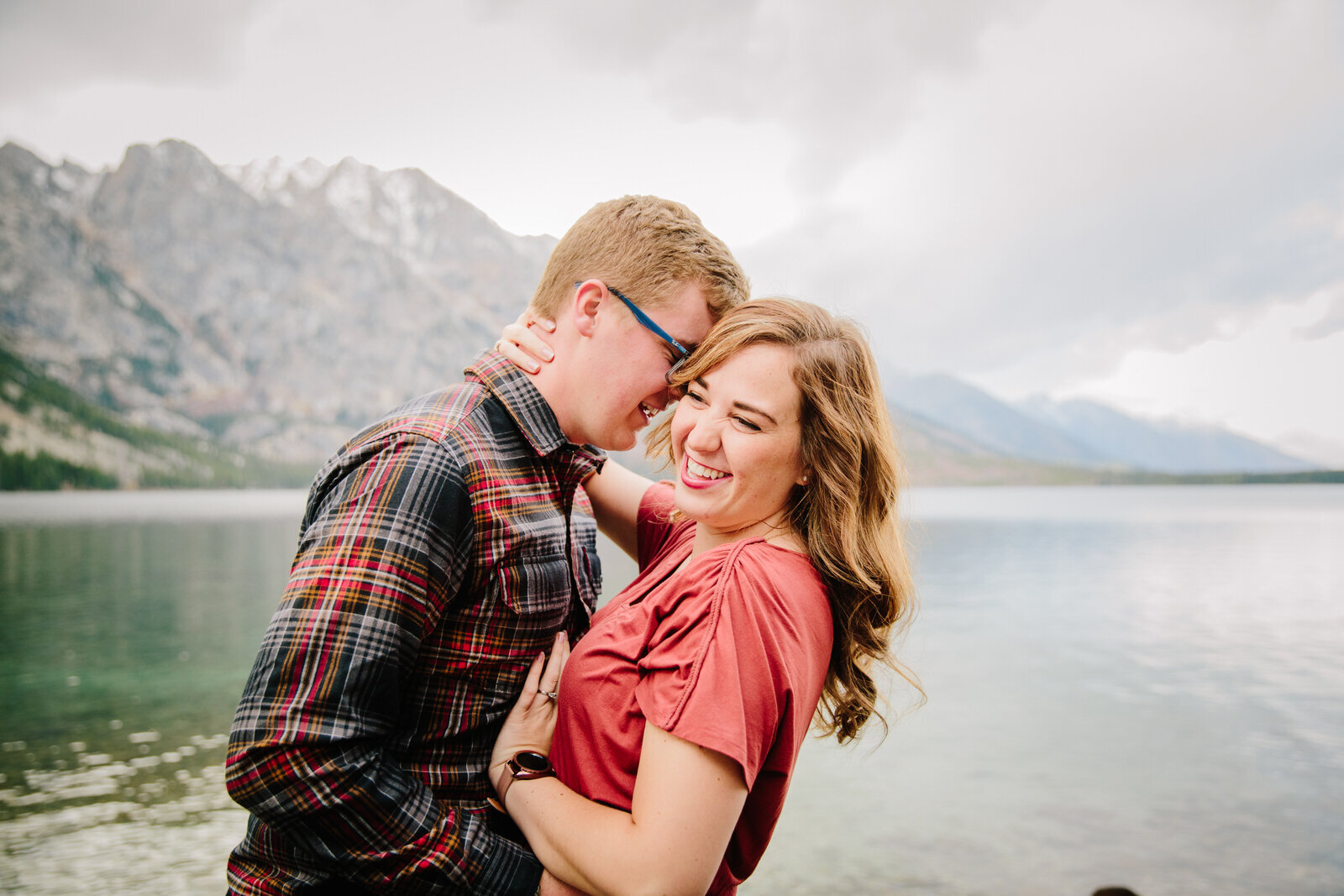 Jackson Hole photographers captures couple embracing during engagement portraits