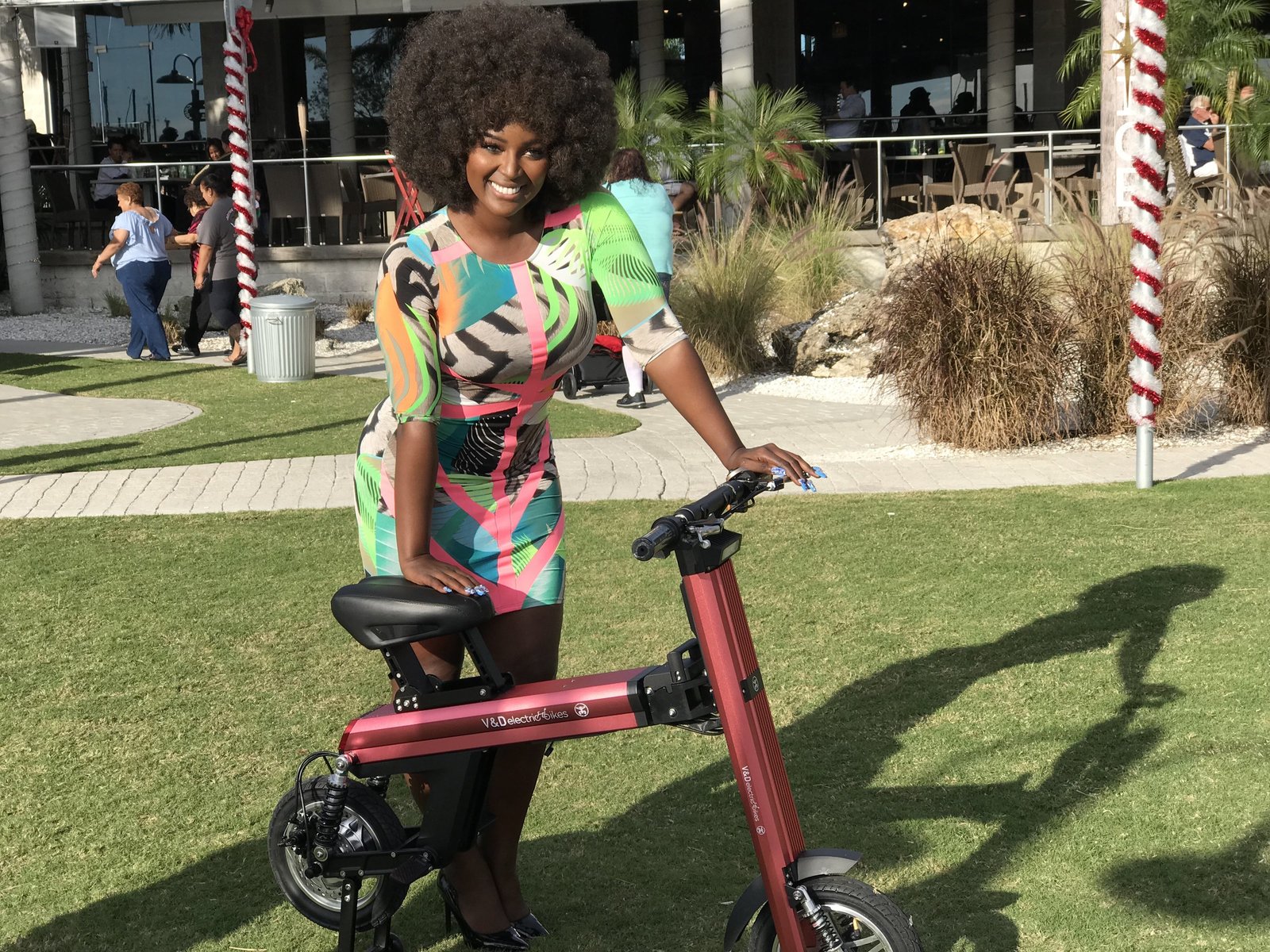 Actress and singer from Love & Hip Hop Amara La Negra is promoting the Red Go-Bike M2