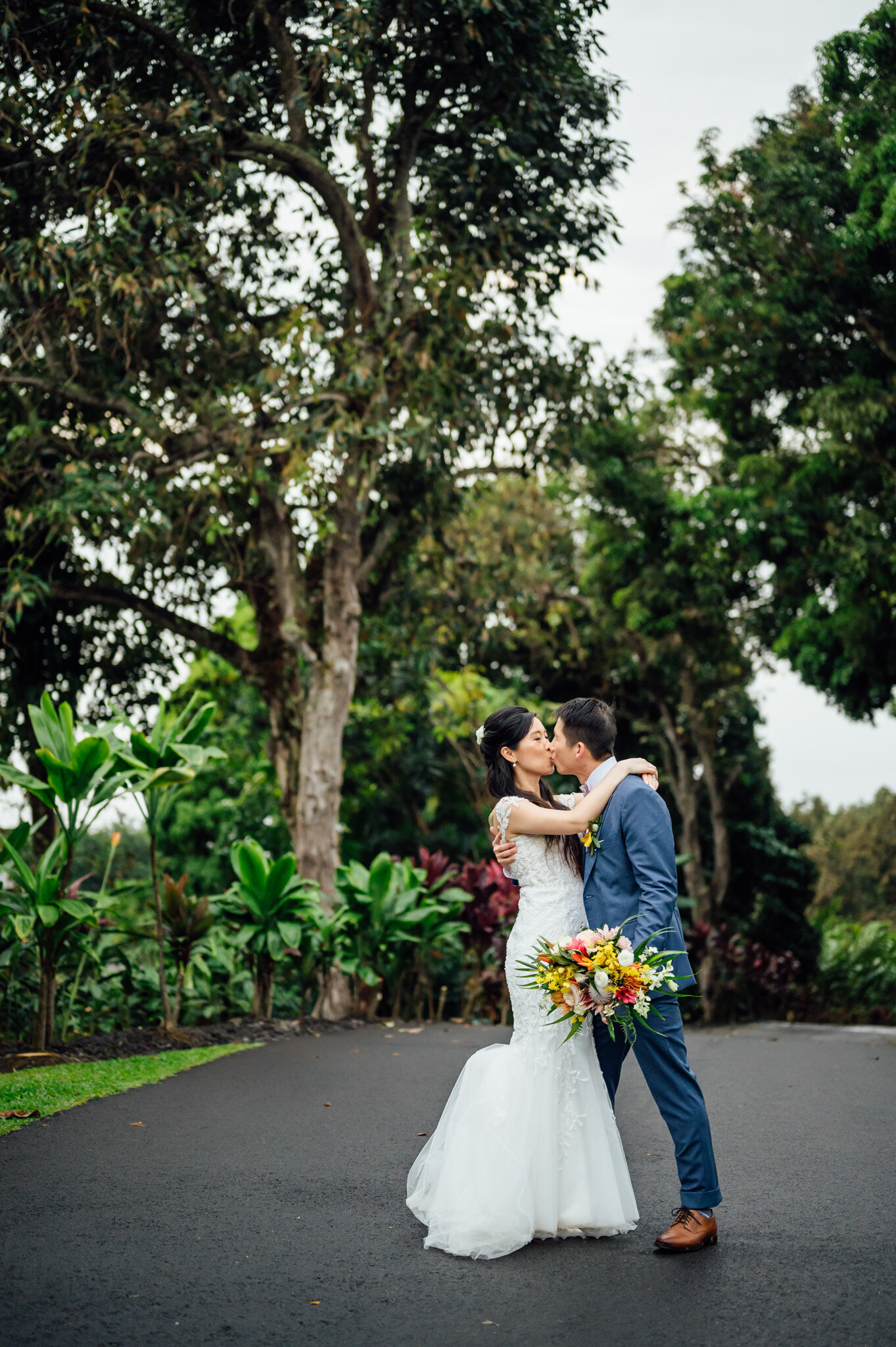 a passionate kiss during big island hawaii wedding