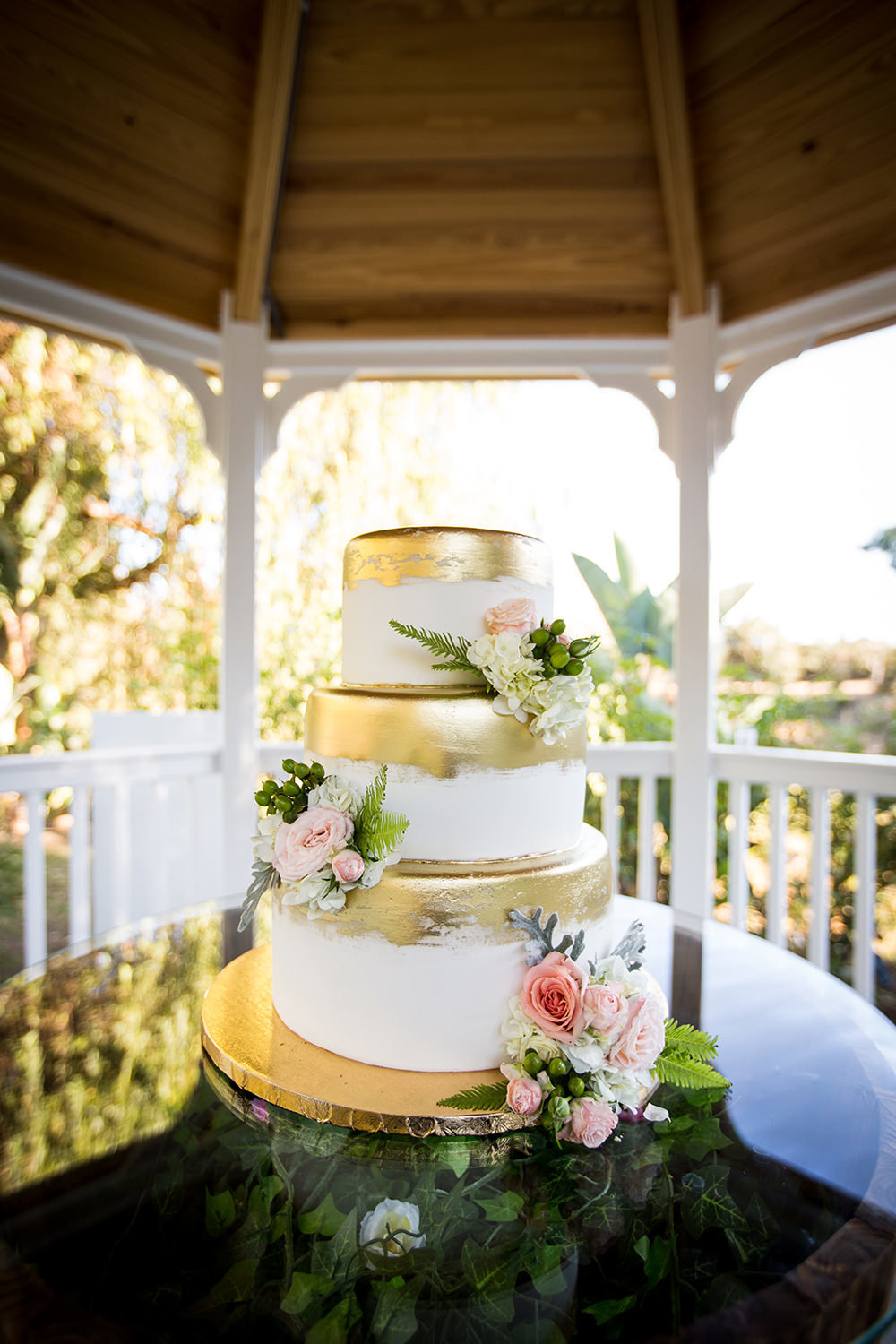wedding cake with gold and pink