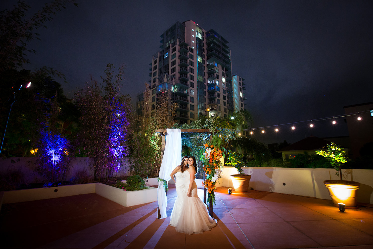 Colorful Night Time Wedding Portrait with light painting