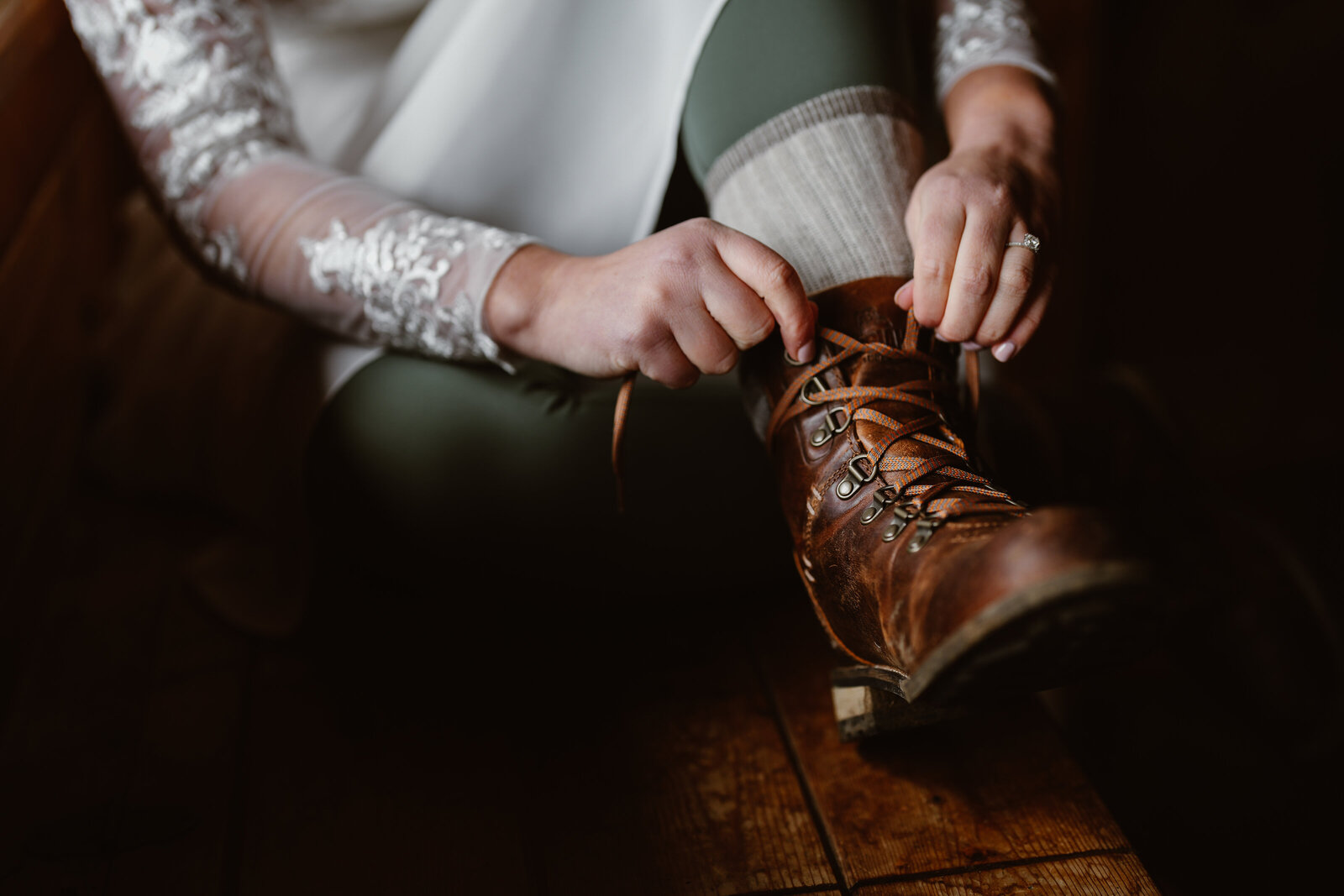 bride tying boots