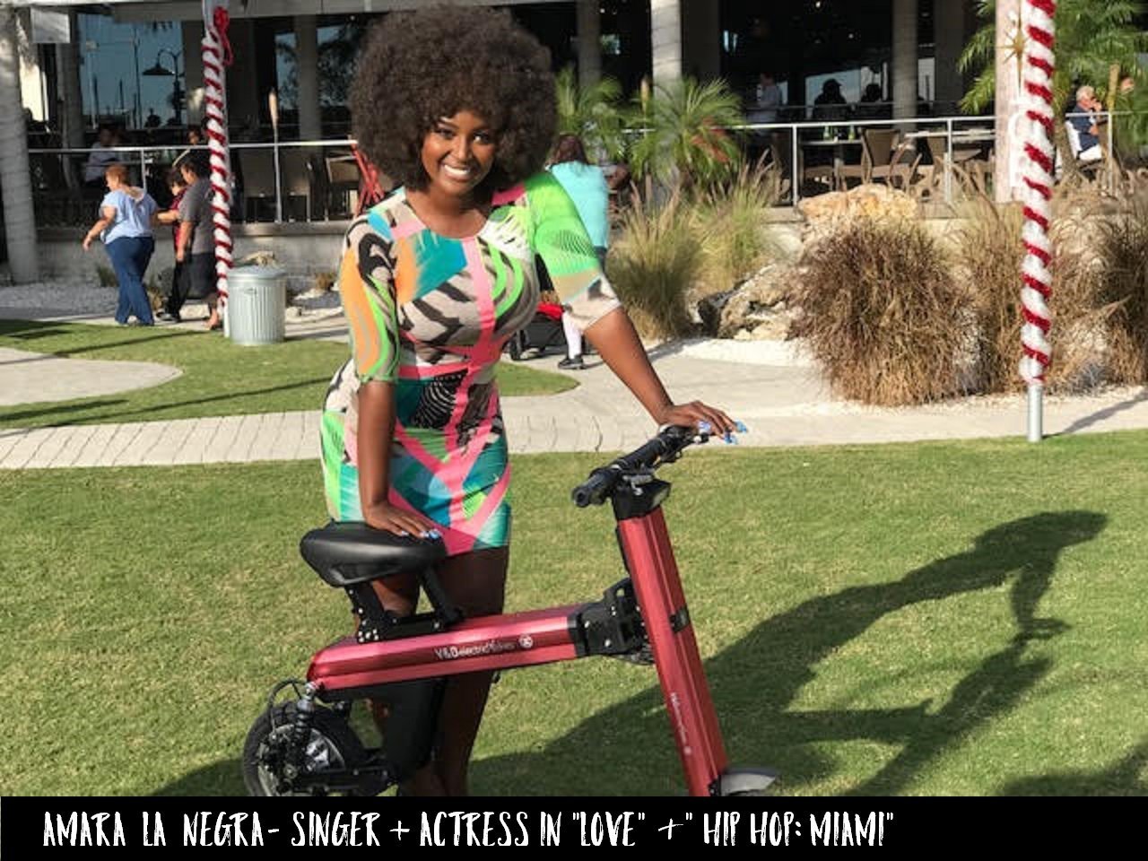 Actress and singer from Love & Hip Hop Amara La Negra is promoting the Red Go-Bike M2
