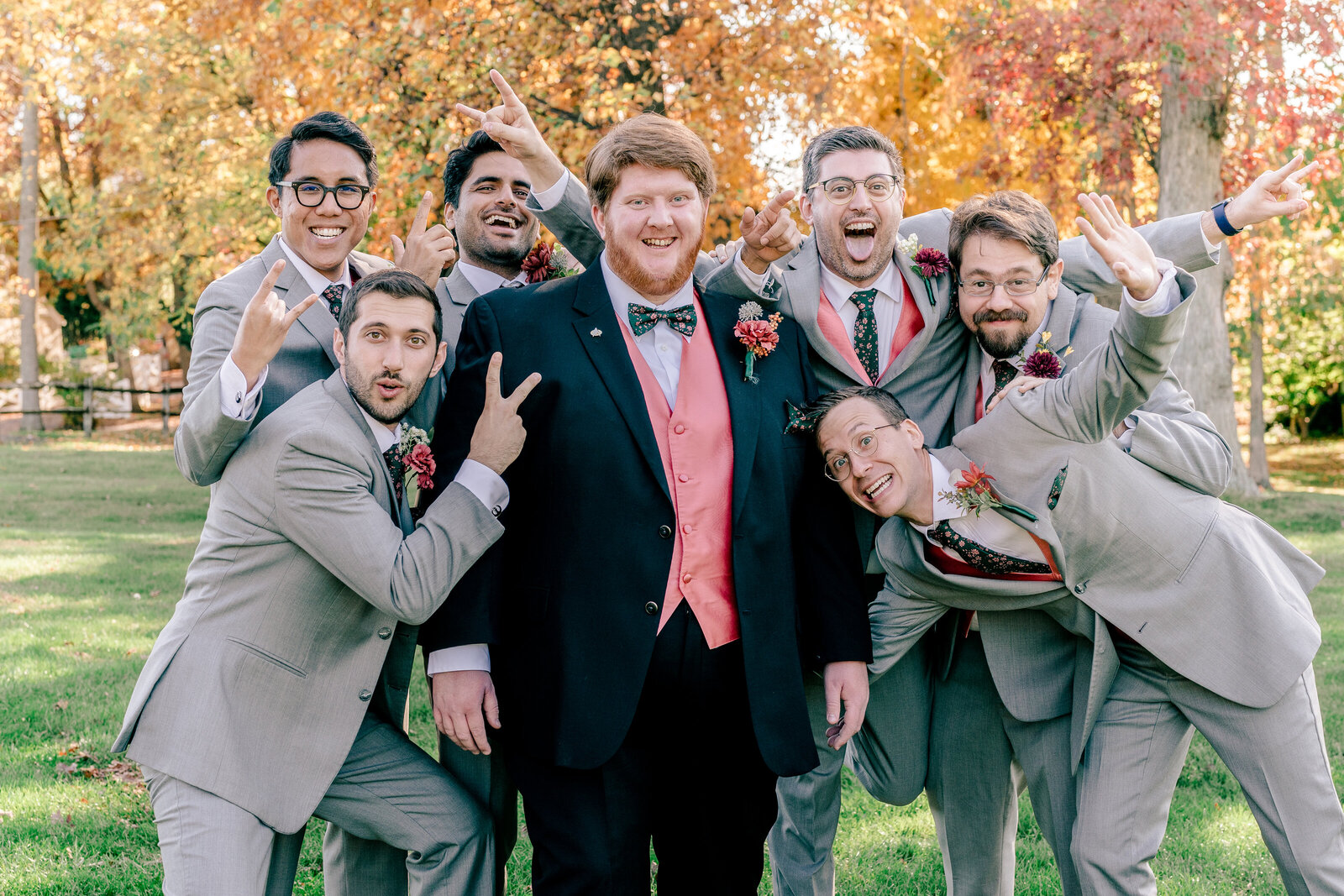 A groom and his groomsmen posing for a funny group picture before his wedding in Northern Virginia