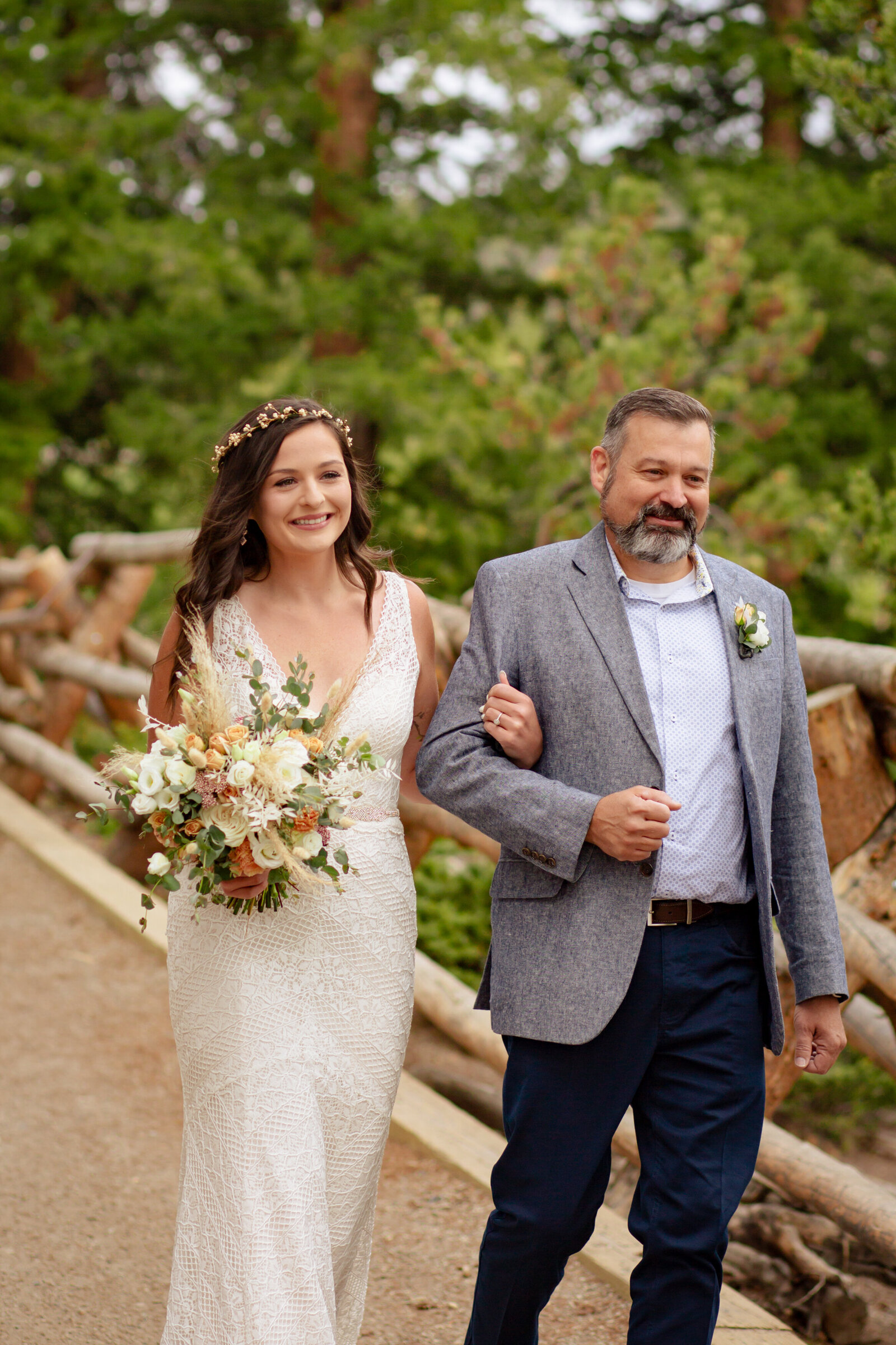 Bride walks down the aisle with her dad